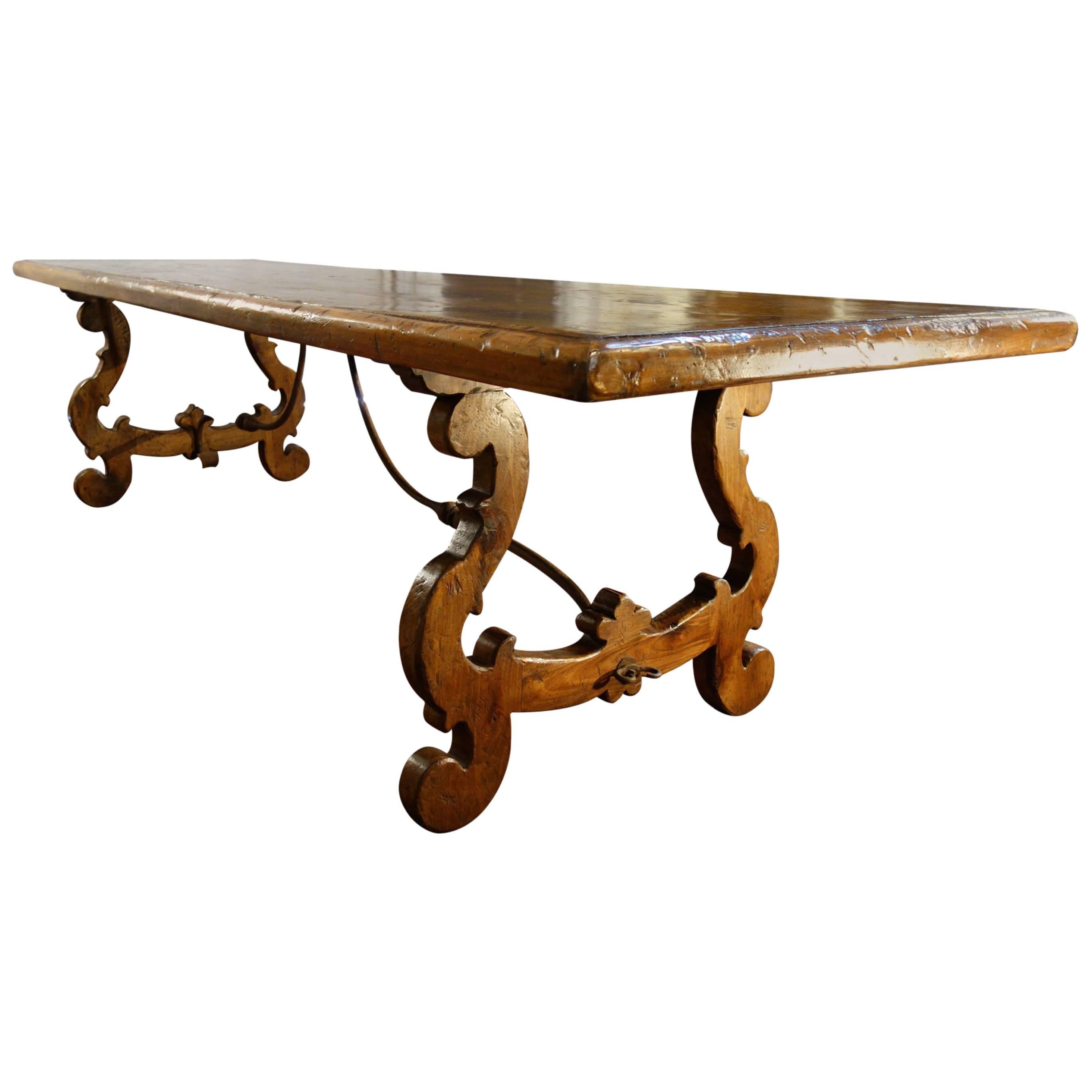 The LIRA refectory table style is adapted from Italian Renaissance designs of the 15th to 19th Centuries. Handcrafted with aged Italian solid hardwoods & hand-forged iron elements and artfully finished in the classic Italian shellac manner by our