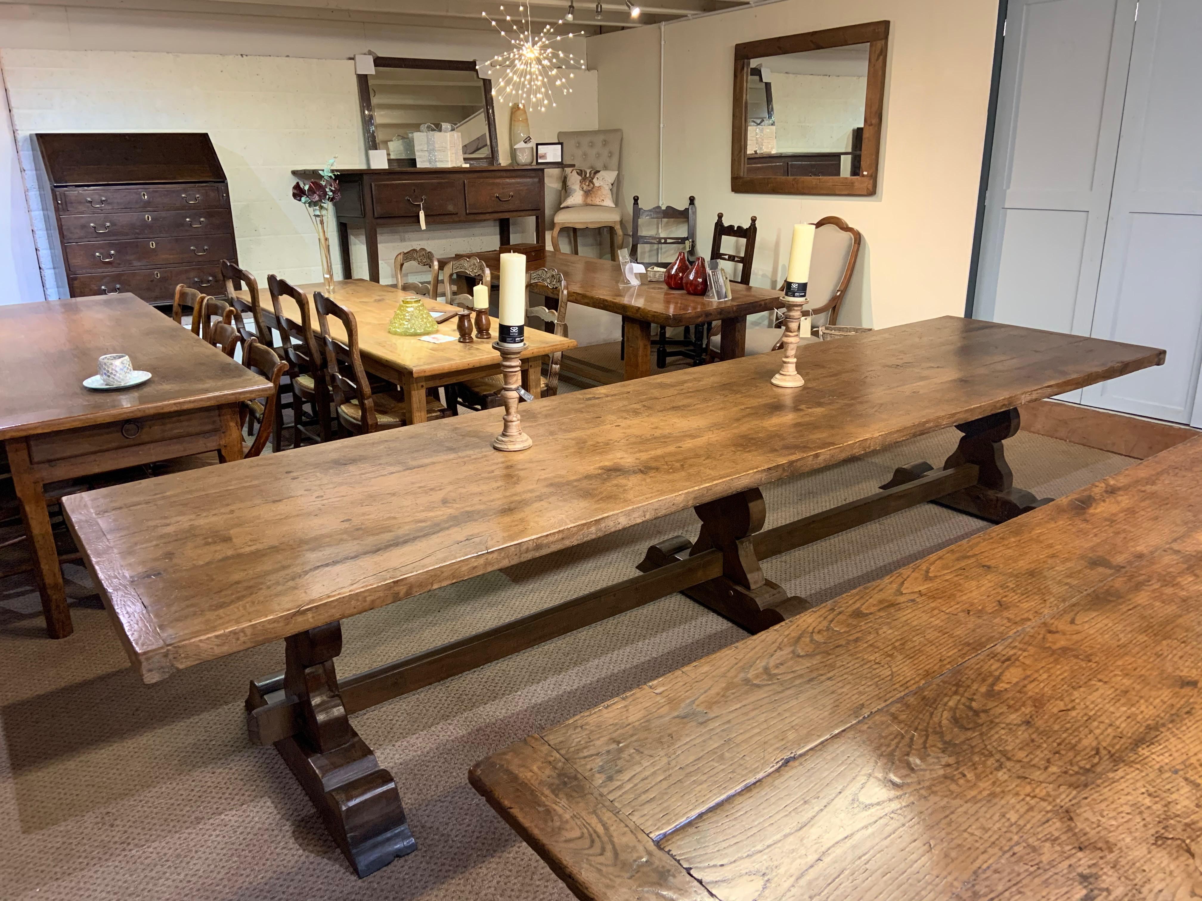 17th century style large trestle farmhouse table with two wide trestle benches and fantastic proportions.
