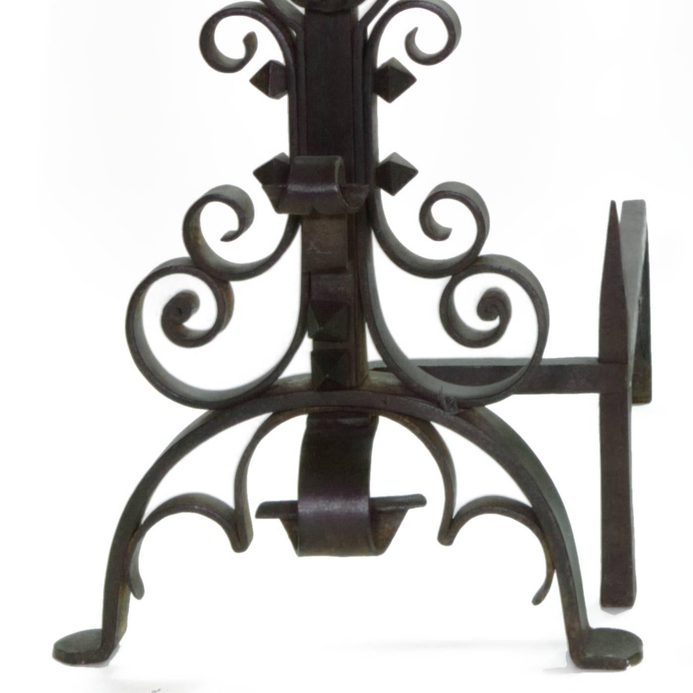 Large pair of 17th century style English andirons with scroll detail.
Hand-forged, circa 1910-1920.