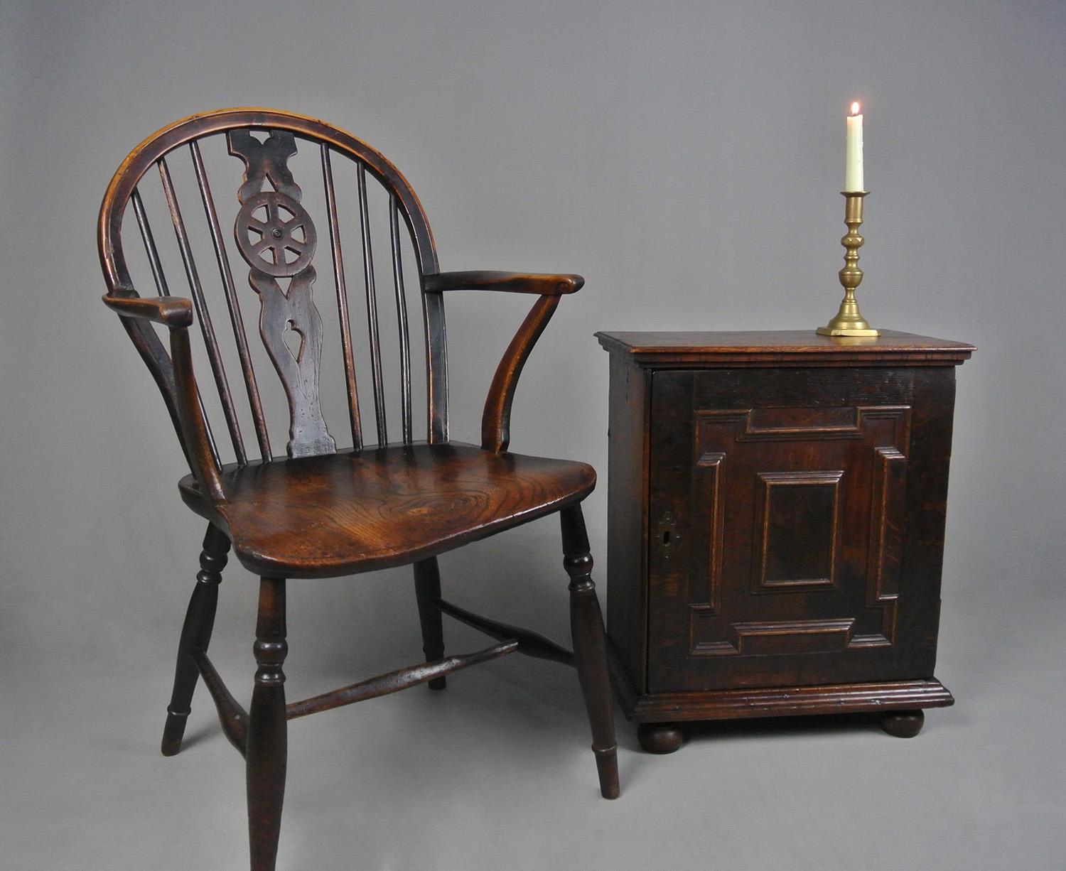 An extremely good and early English oak spice cabinet - beautiful, useful and well made - with an excellent colour and in superb original condition.

In the 16th and 17th centuries spices such as nutmeg, cinnamon and cloves were as expensive per