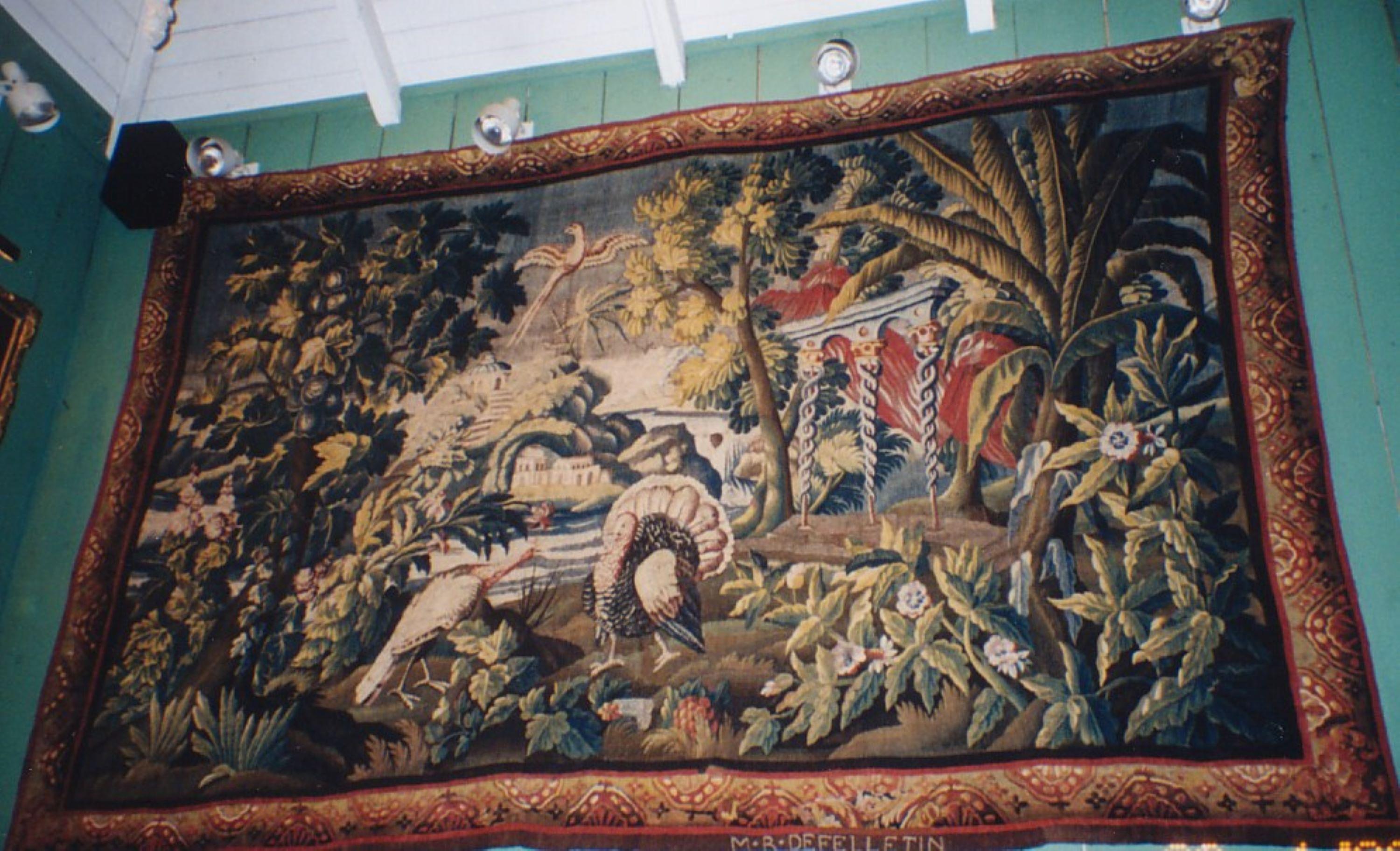 17th century tapestry of the AMERICAS manufactured: Royale De Felletin
“The Americas” In a beautiful landscape composed of water exotic trees plants villages castles and Turkey birds. Very rich borders exceptional colors of wools and silk, their