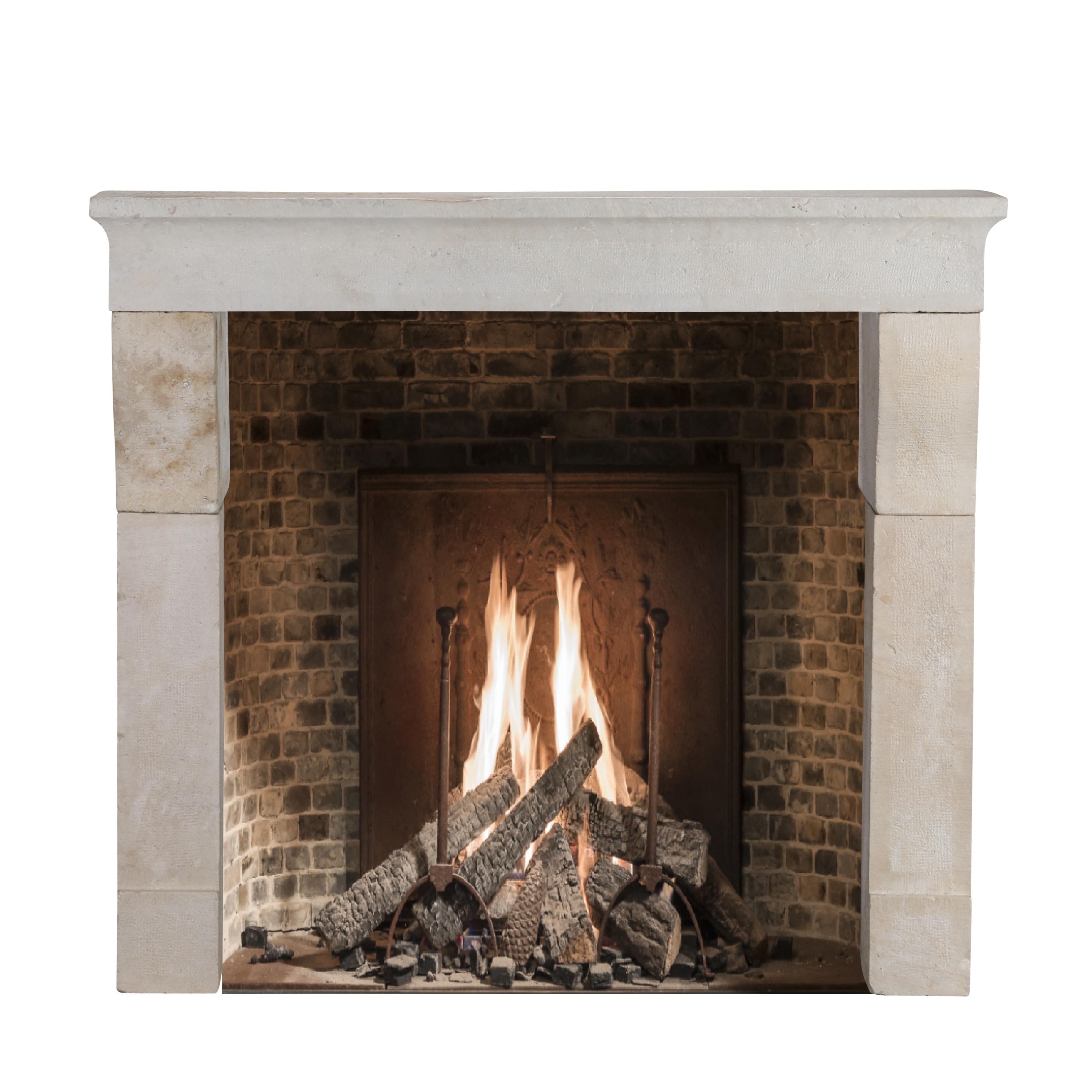Hand-Carved 17th Century Timeless Rustic Louis XIII Limestone Fireplace Mantel For Sale