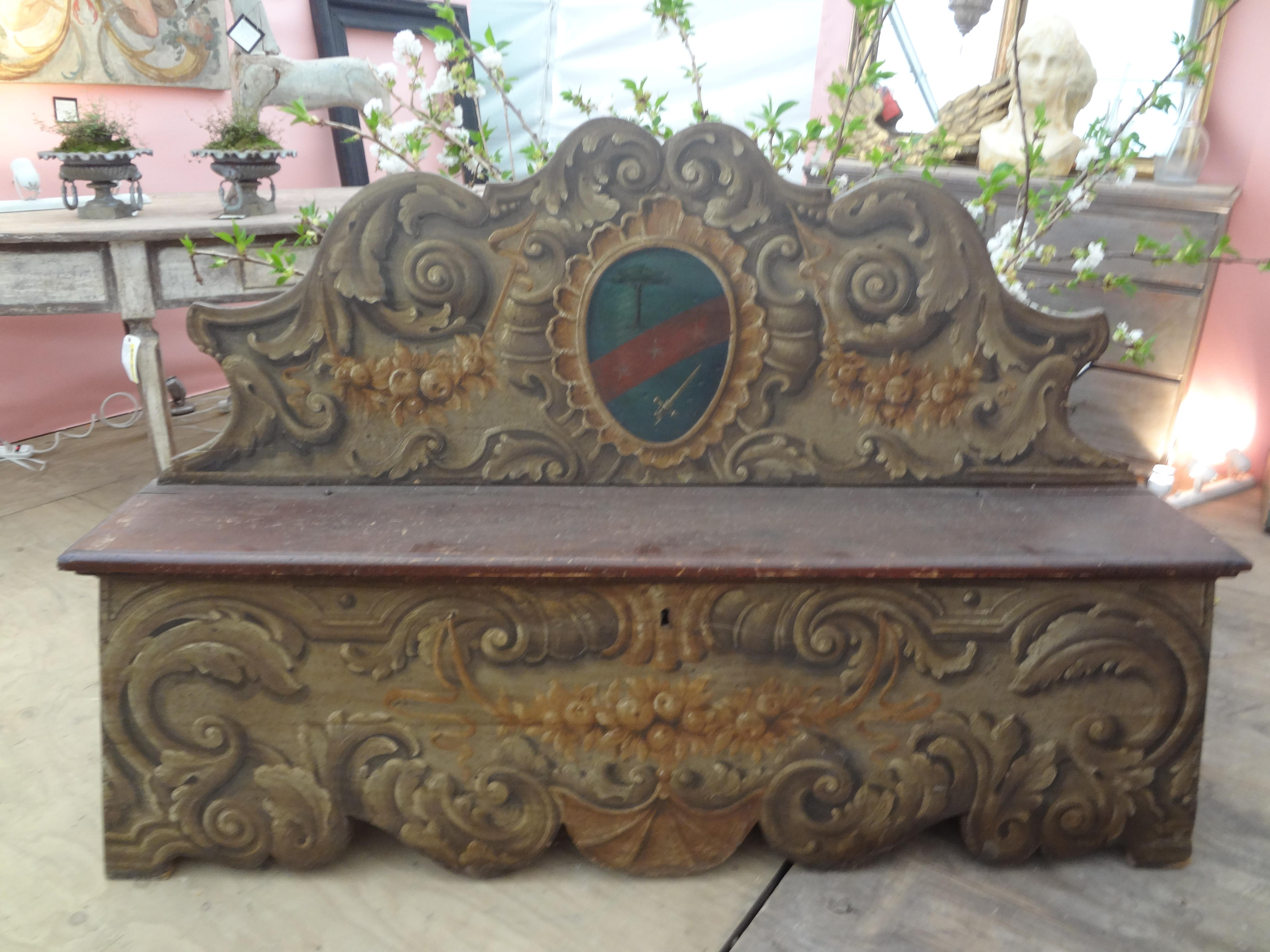 17th century Tuscan cassapanca Or Bench With A Family Crest.
Stunning 17th century Tuscan cassapanca or hand decorated bench with a family crest. This lovely bench or hall bench has a lid that lifts with storage inside. Our Italian painted bench