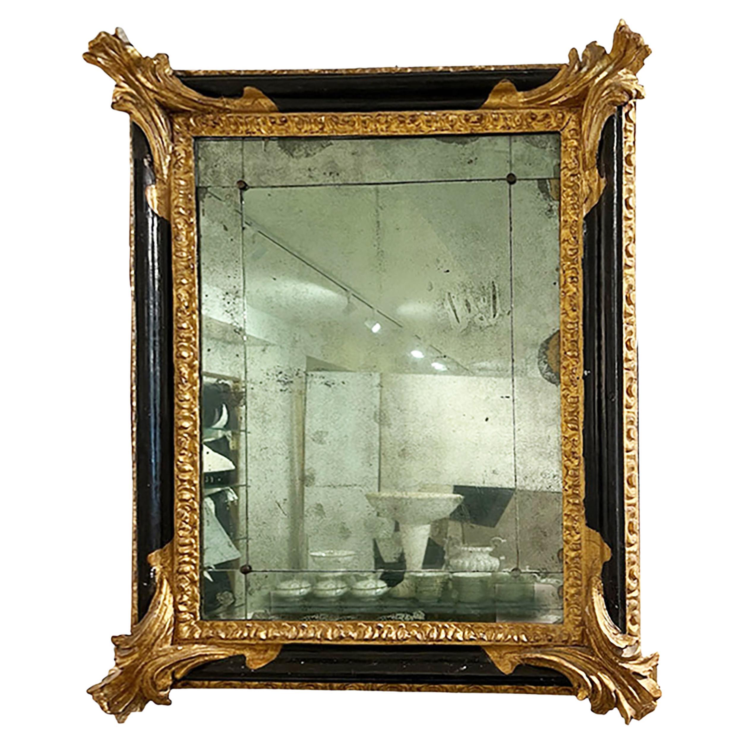 17th Century Venetian Ebonized and Giltwood Mirror
