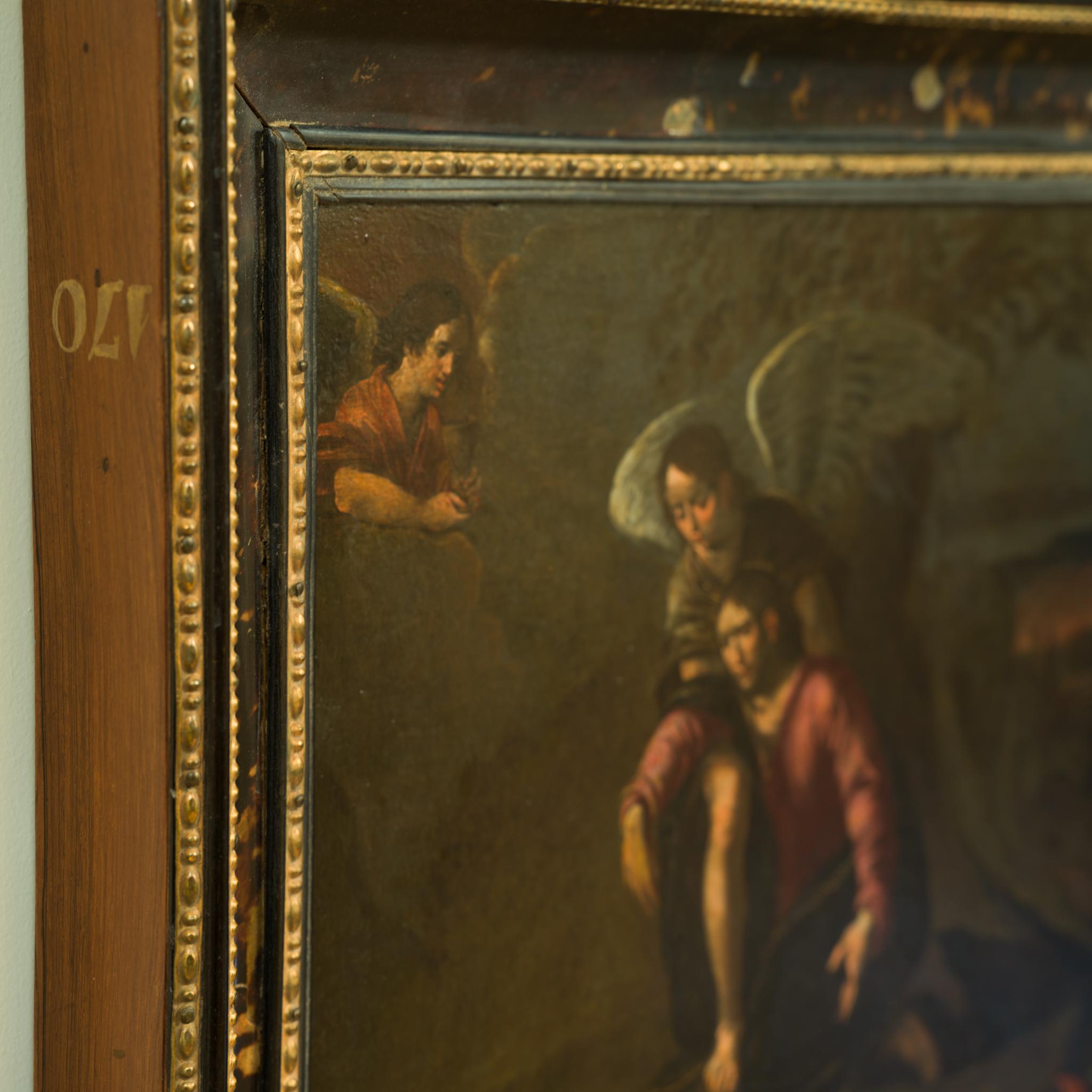 Esta evocadora pintura de la Escuela Veronesa capta el momento en el Huerto de Getsemaní en que Cristo, abrumado por el dolor, reza a Dios antes de su arresto y crucifixión. Sostenido por un ángel, se le representa en un momento de agonía física y