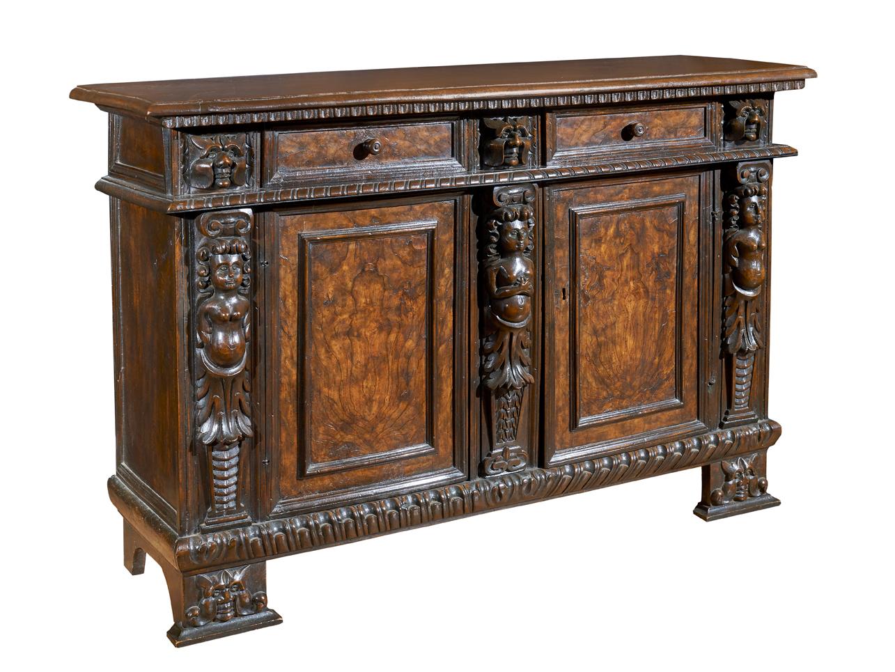 Bergamasca sideboard with two drawers under the two-door top in solid walnut and walnut burl measures 160 x 110 x 55 cm. 

This impressive but really elegant piece of furniture offers us a precious testimony of the evolution that 600 is having; a