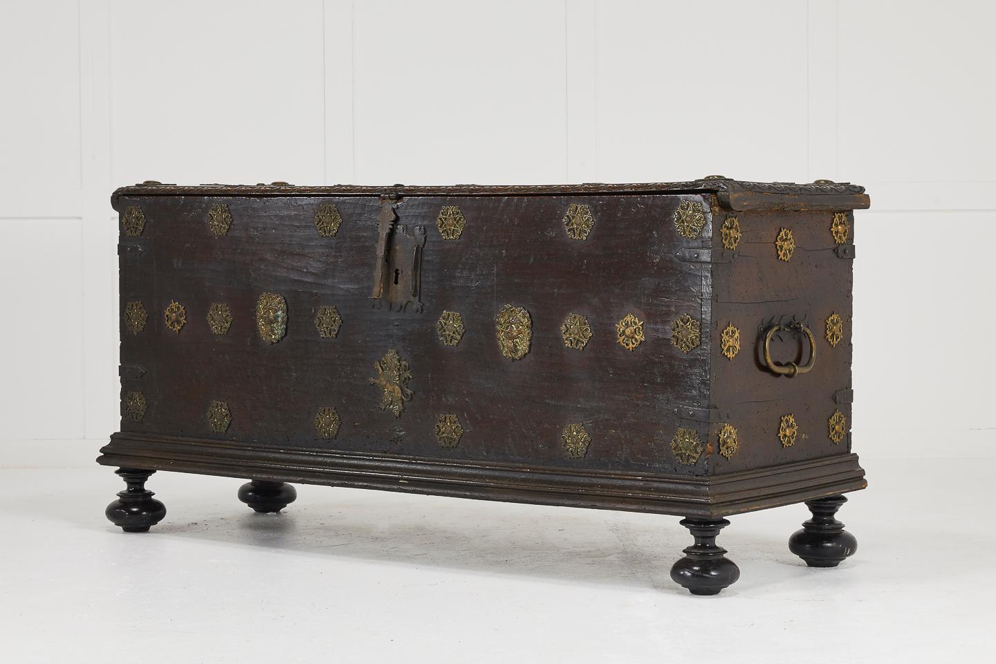 17th Century walnut Spanish trunk with great patina and fantastic applied brass-work.

Dimensions:
H 27¾