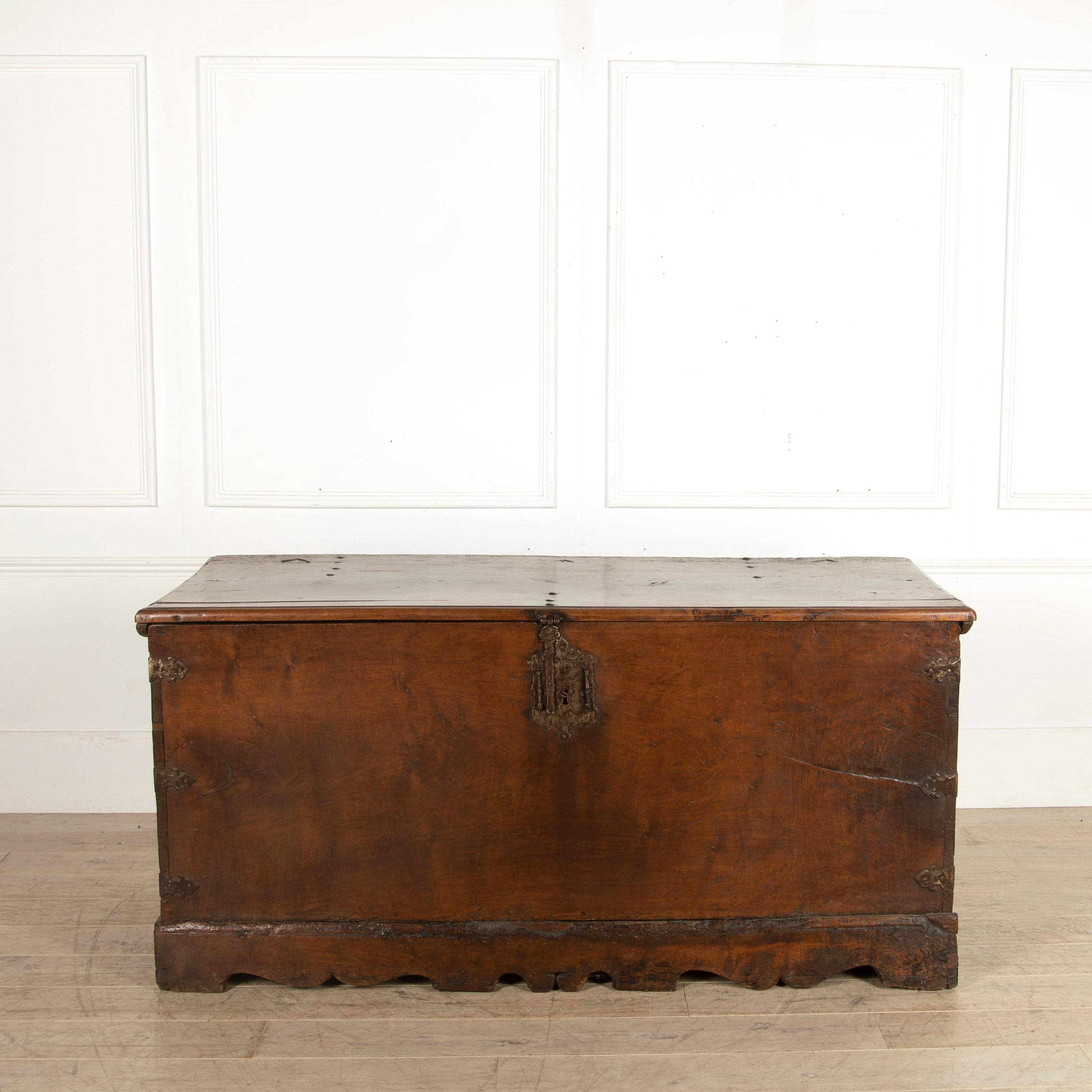 French 17th century solid walnut coffer/chest. Dating from circa 1620, beautiful patina and age to this imposing piece from a French Château, beautifully constructed from solid walnut with a huge piece of single plank walnut to the front. Handsome