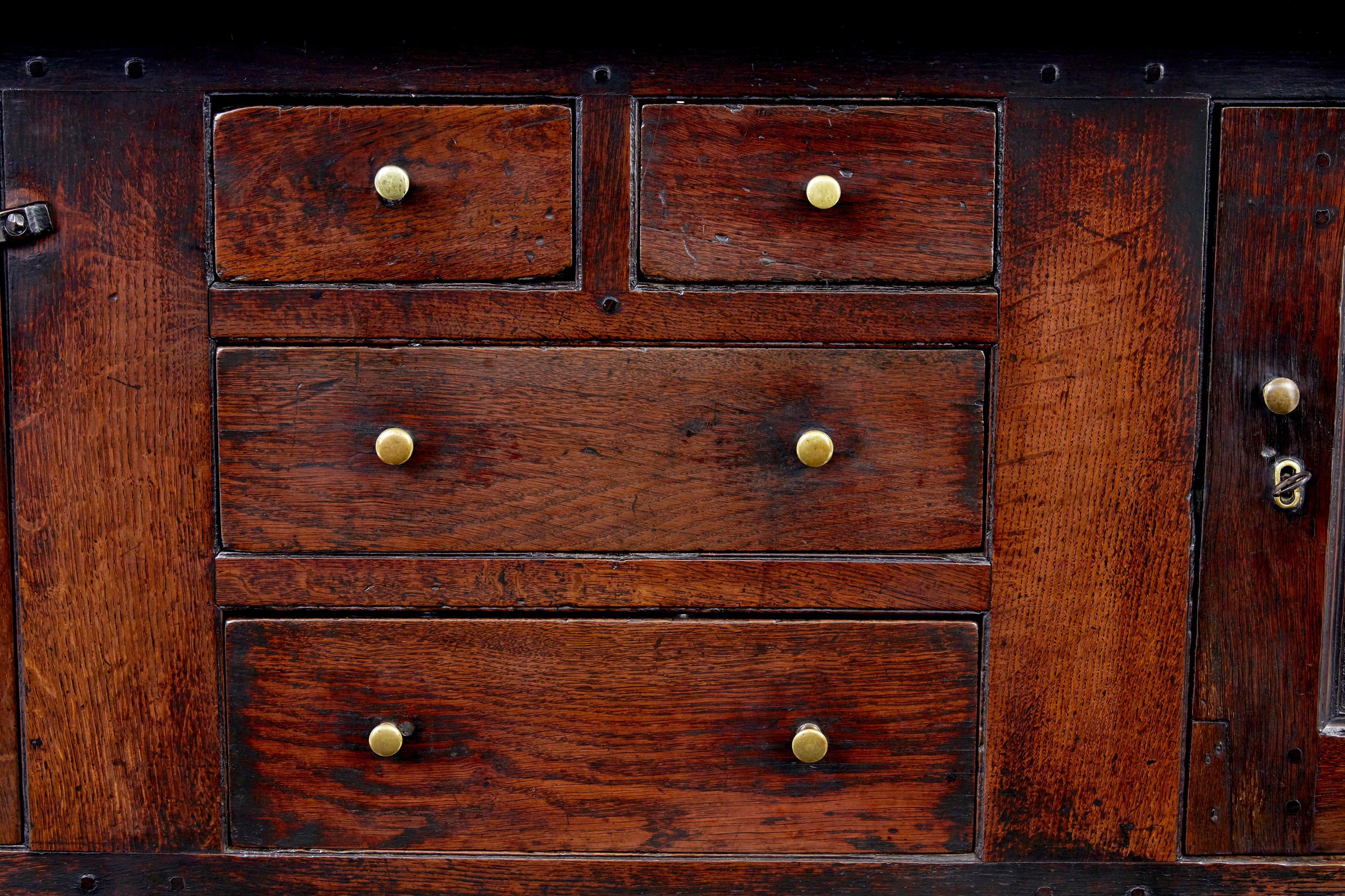 Hand-Carved 17th Century Welsh carved oak court cupboard For Sale