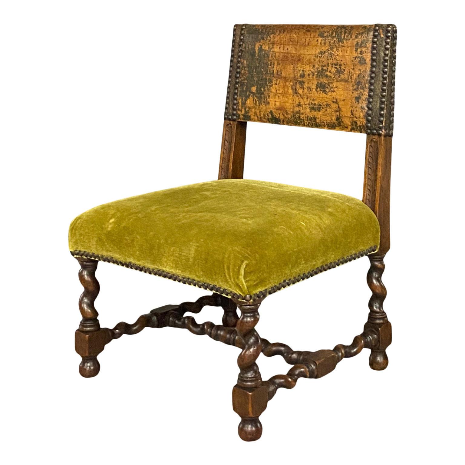 Charming antique Welsh children’s chair upholstered in green mohair and leather from the 17th century

Turned legs and stretchers

23?H x 14?D x 11? Seat Height, 16?.