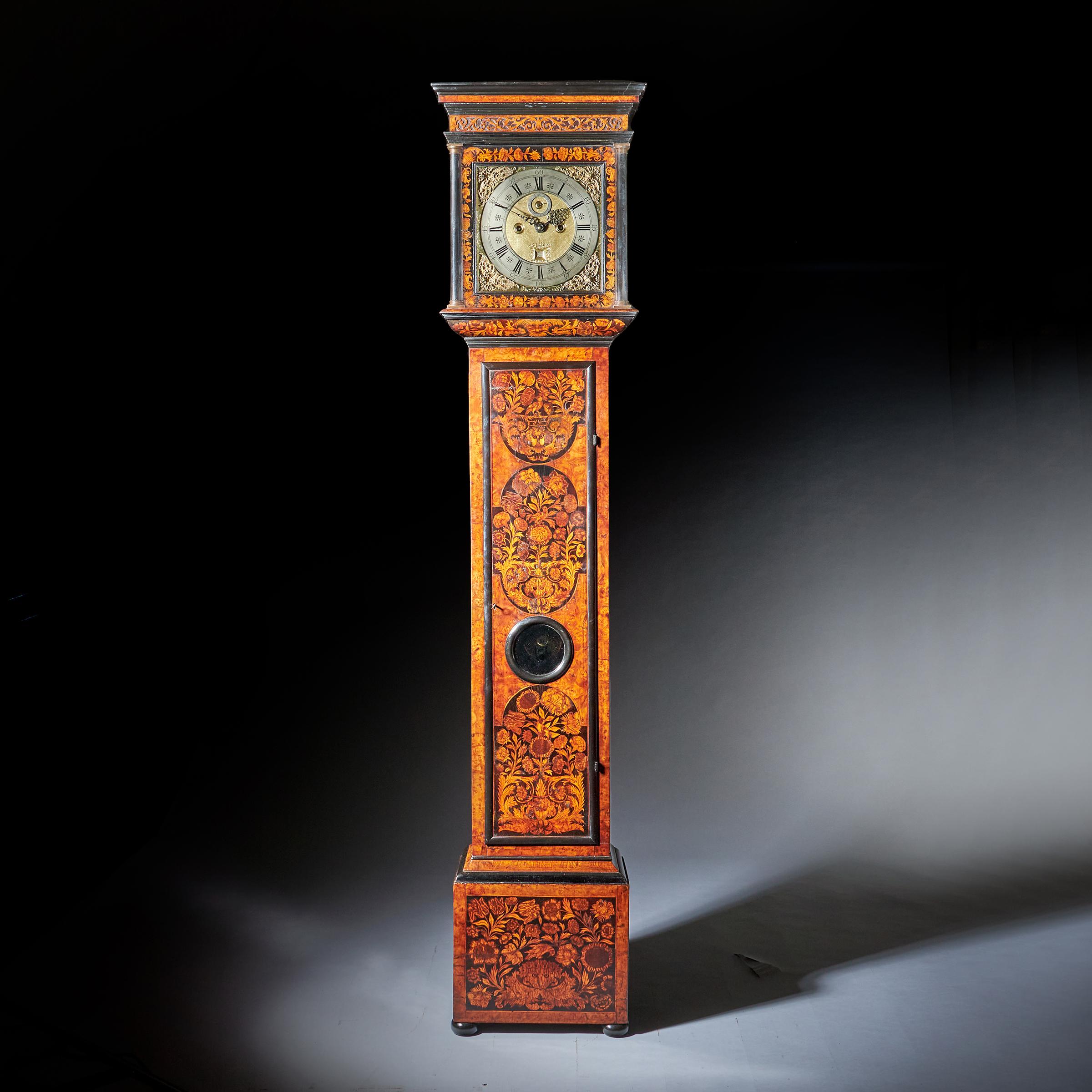 A superb William and Mary eight-day burl elm floral marquetry longcase clock by Henry Godfrey London, c. 1695-1700.

The outstanding burl elm case is of the highest quality and decorated throughout in very attractive floral and leaf marquetry
