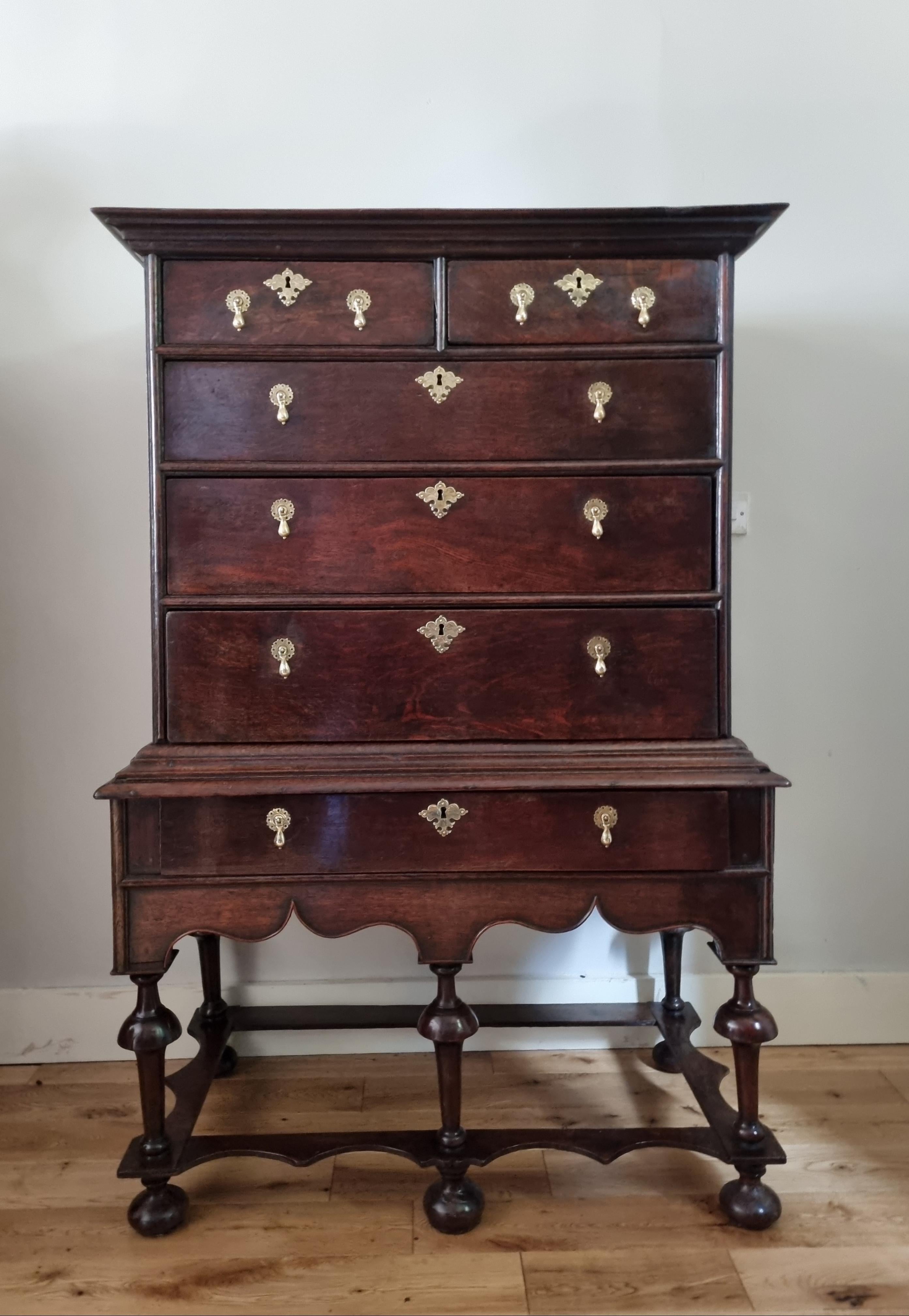An extremely rare English William & Mary Oak Chest on stand, dating back to circa 1690, beautifully proportioned, fantastic colour and deep patination . featuring two short drawers and three long drawers, with a single long drawer positioned above