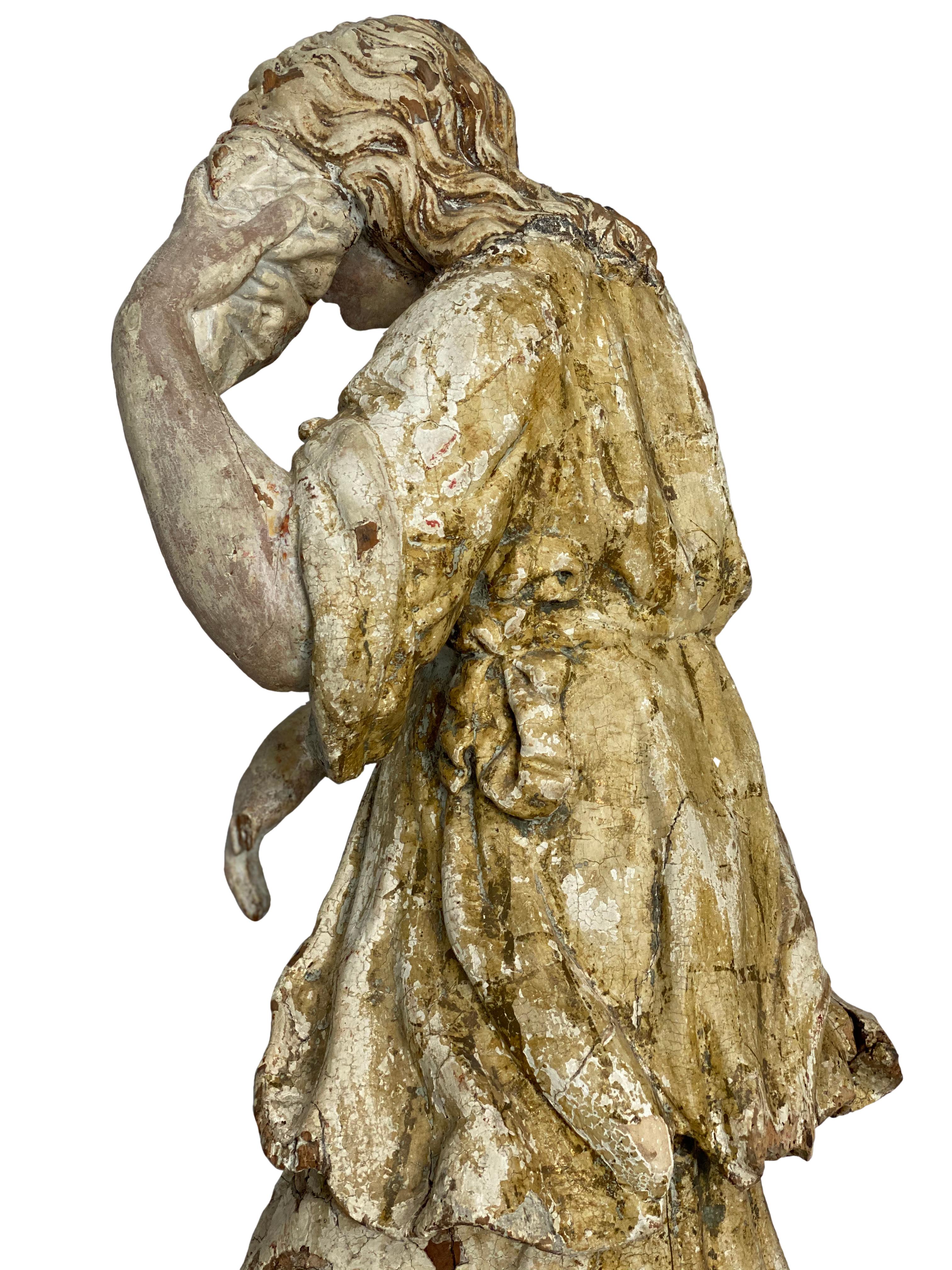 wooden statue of mary magdalene