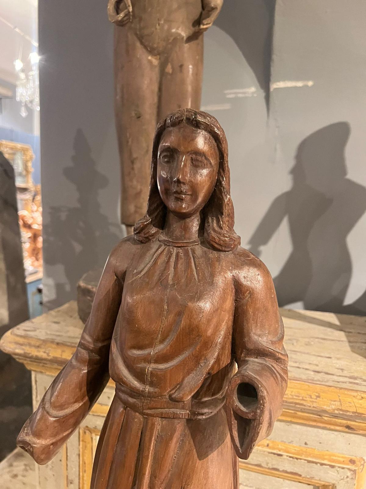 18th Century and Earlier 17th Century Wooden sculpture depicting a female figure For Sale