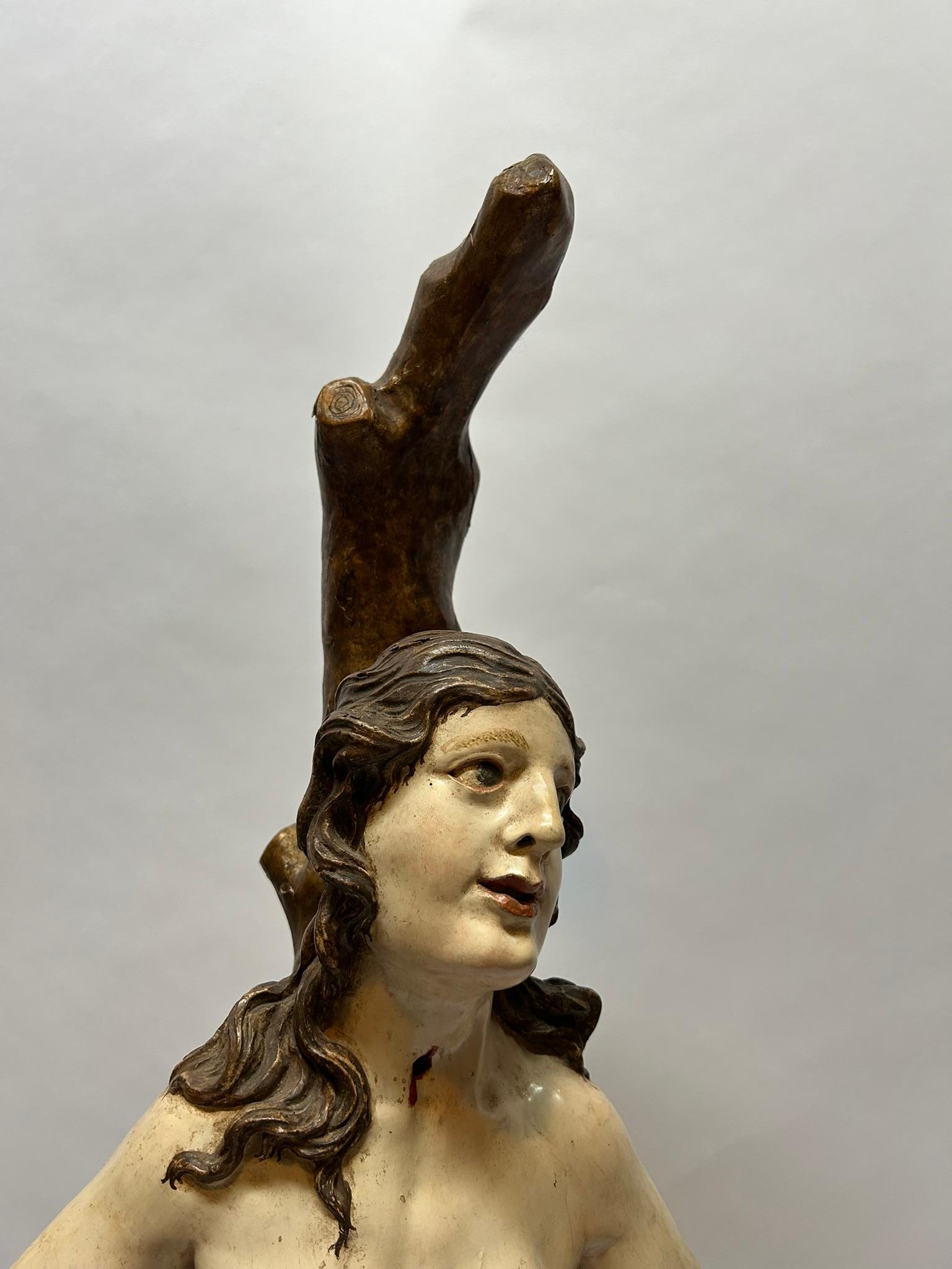 Beautiful carved  17th Century Wooden sculpture of Saint Sebastian.
Original polychrome and very good condition.
North Italy 

Nothing is known about St. Sebastian's youth other than the fact he may have come from southern France and he was educated