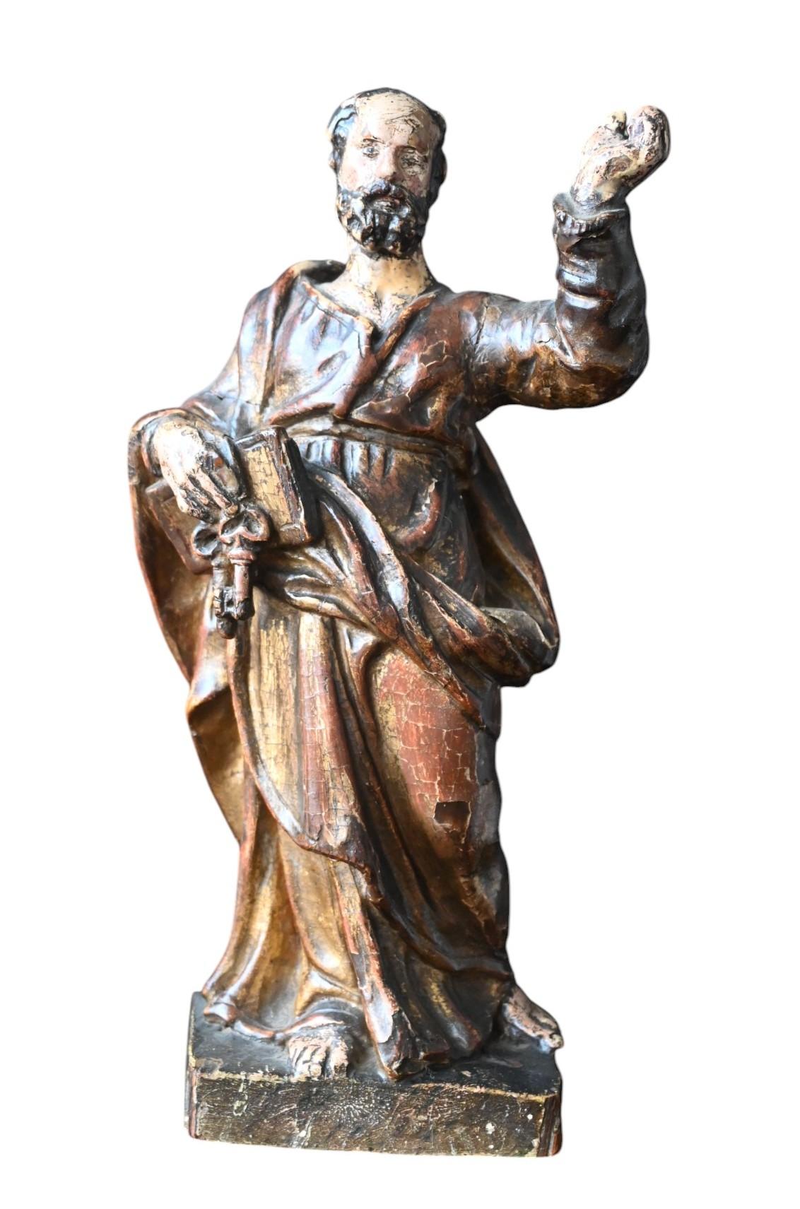 Una statua del XVII secolo scolpita in legno di quercia con la sua policromia originale nella presentazione dell'apostolo Peters.
Altezza totale 27.5 cm