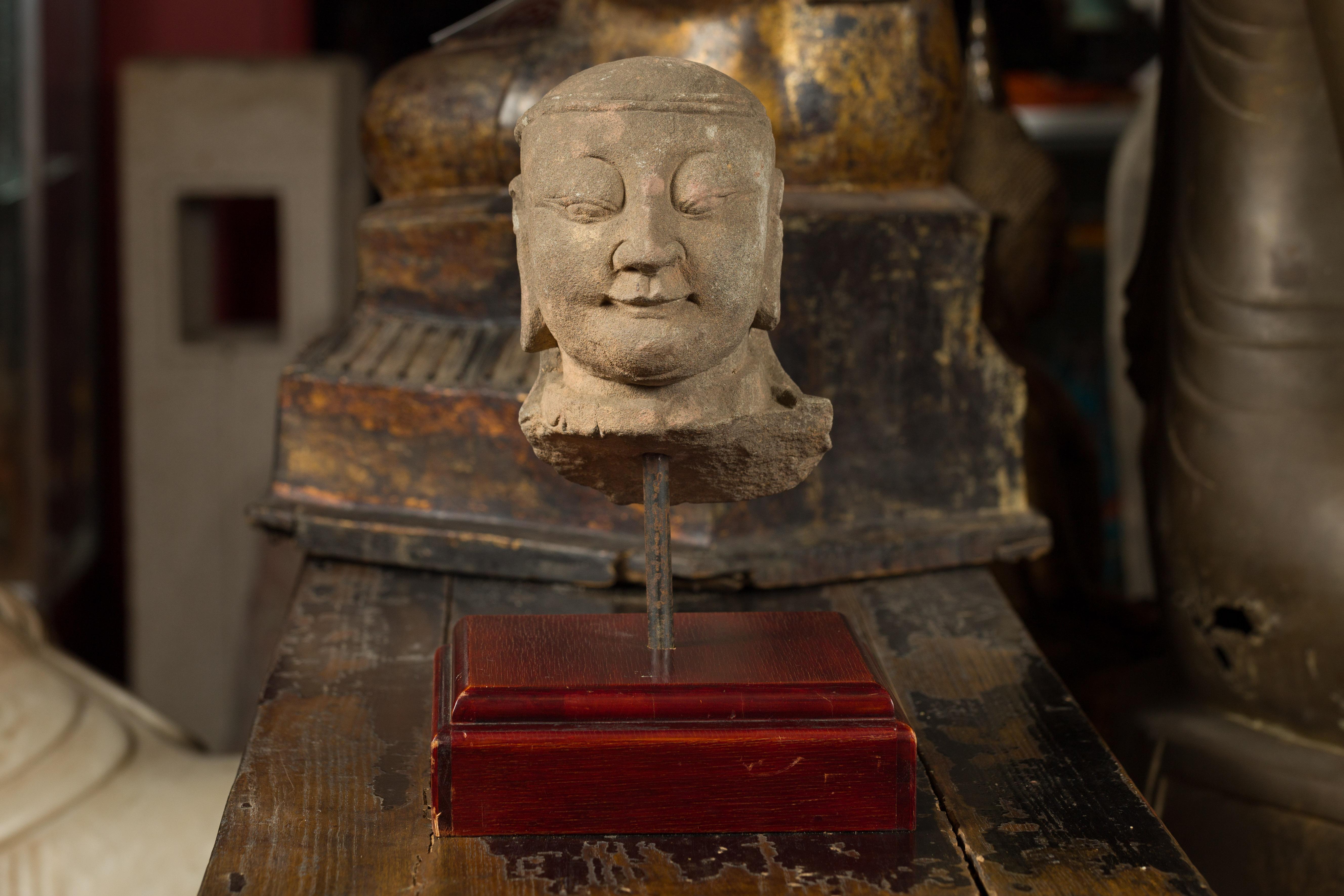 17th or 18 Century Burmese Hand Carved Stone Head of a Man Mounted on Base In Good Condition For Sale In Yonkers, NY