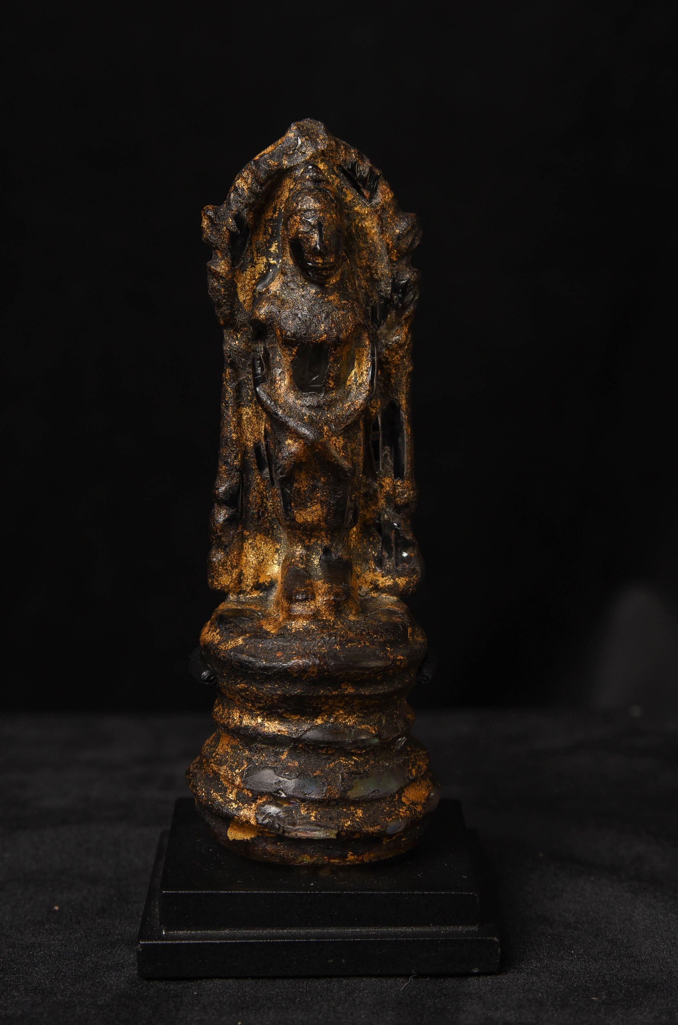 Rare 17thC or earlier Thai or Laos crystal Buddha with the original lacquer and gilding. Some wear and loss as seen in the photos. I've never seen another with an original surface like this. Very powerful piece. Could use a stand. Height: 4.75