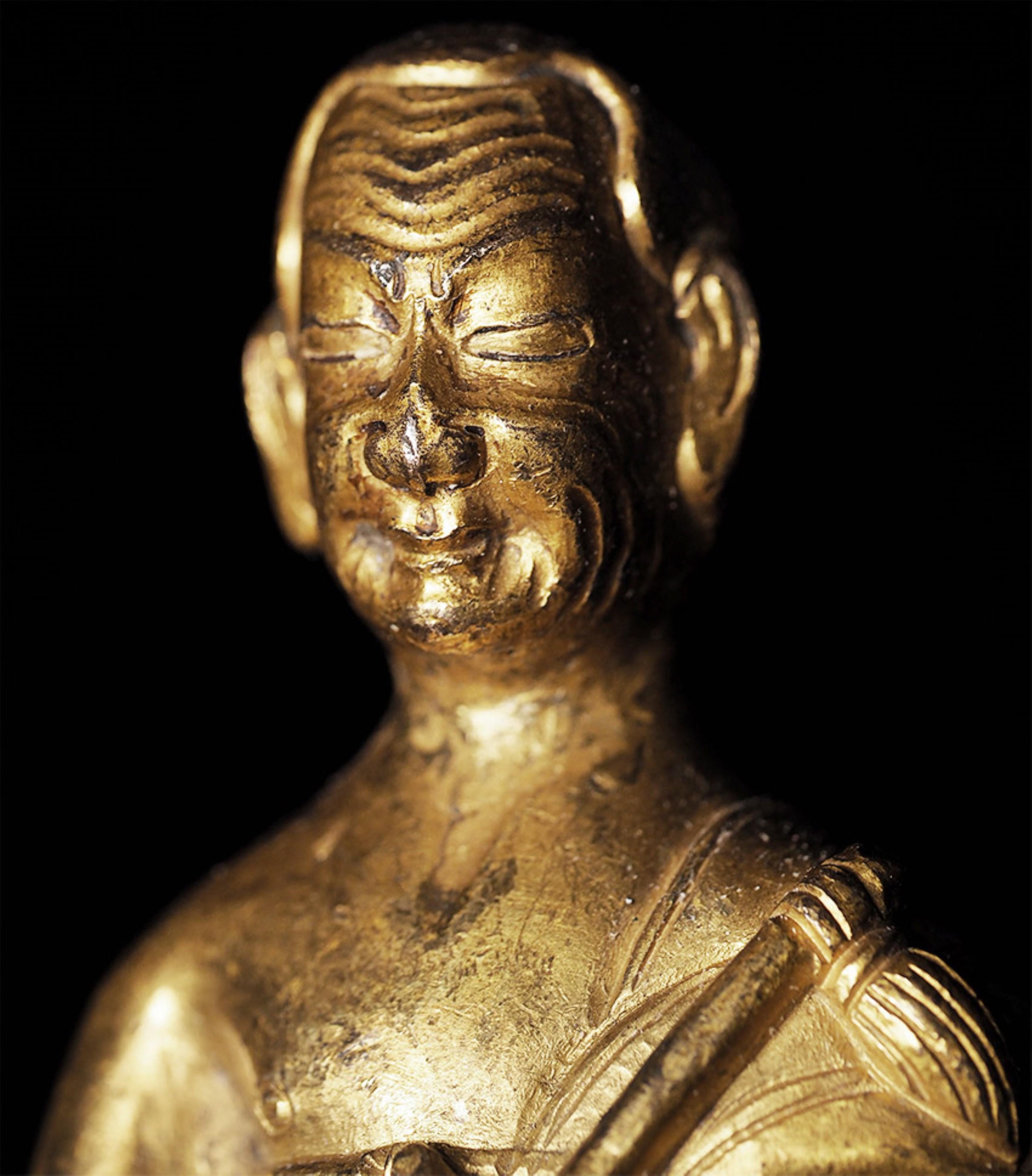 17thC or earlier Tibetan Buddhist Portrait Statue of a Monk in copper.-Animated For Sale 1