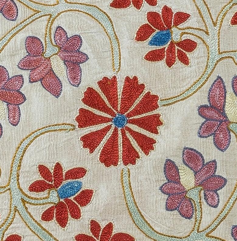 Decorative Suzani cushion cover featuring hand embroidered silk on silk background, flowers and vine motifs, linen backing with zipper, no insert.
Delicate and specialised washing advised.
Suzani, a Central Asian term for a specific type of