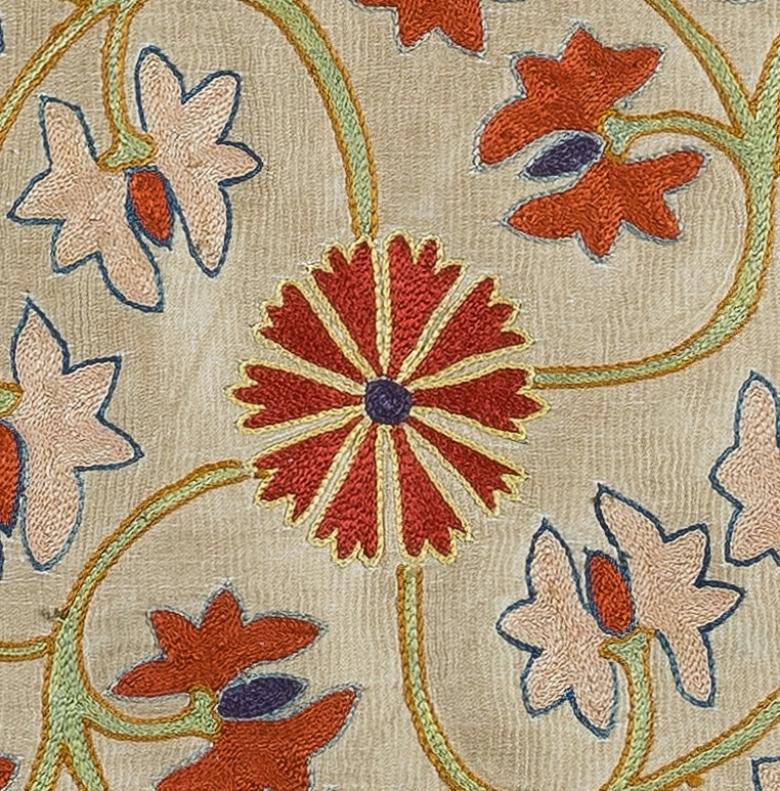 Decorative suzani cushion cover made of hand embroidery silk on silk background, flowers and vine motifs, linen backing with zipper, no insert.

Delicate and specialised washing advised.

Suzani is a type of hand-embroidered and decorative tribal