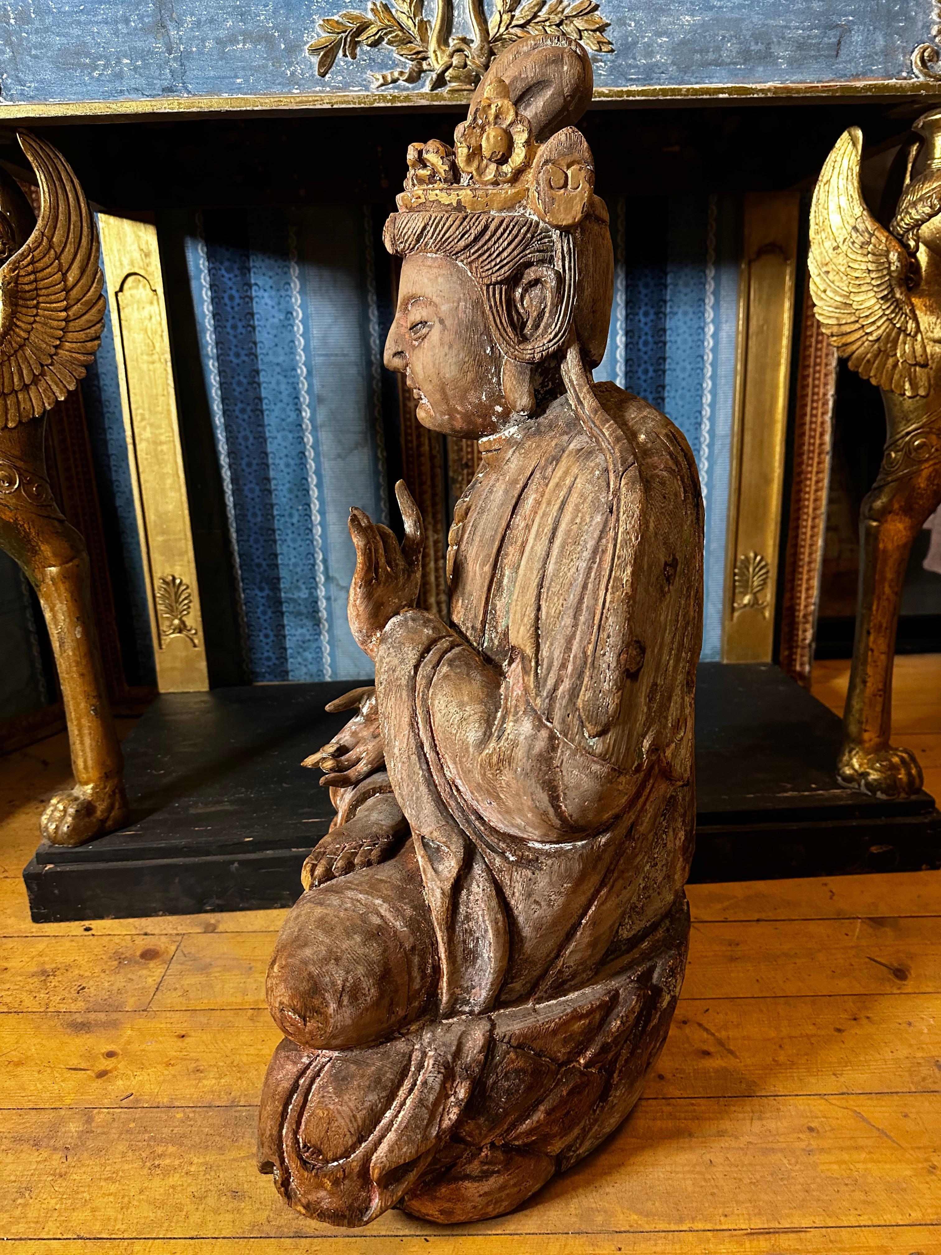 Bodhisattva, a religious sculpture, probably made in India 1750-1850.
The sculpture has been painted and gilded, but with very little remains.

Bodhisattva, in Buddhism, is one who seeks awakening, an individual on the path to becoming a Buddha.
