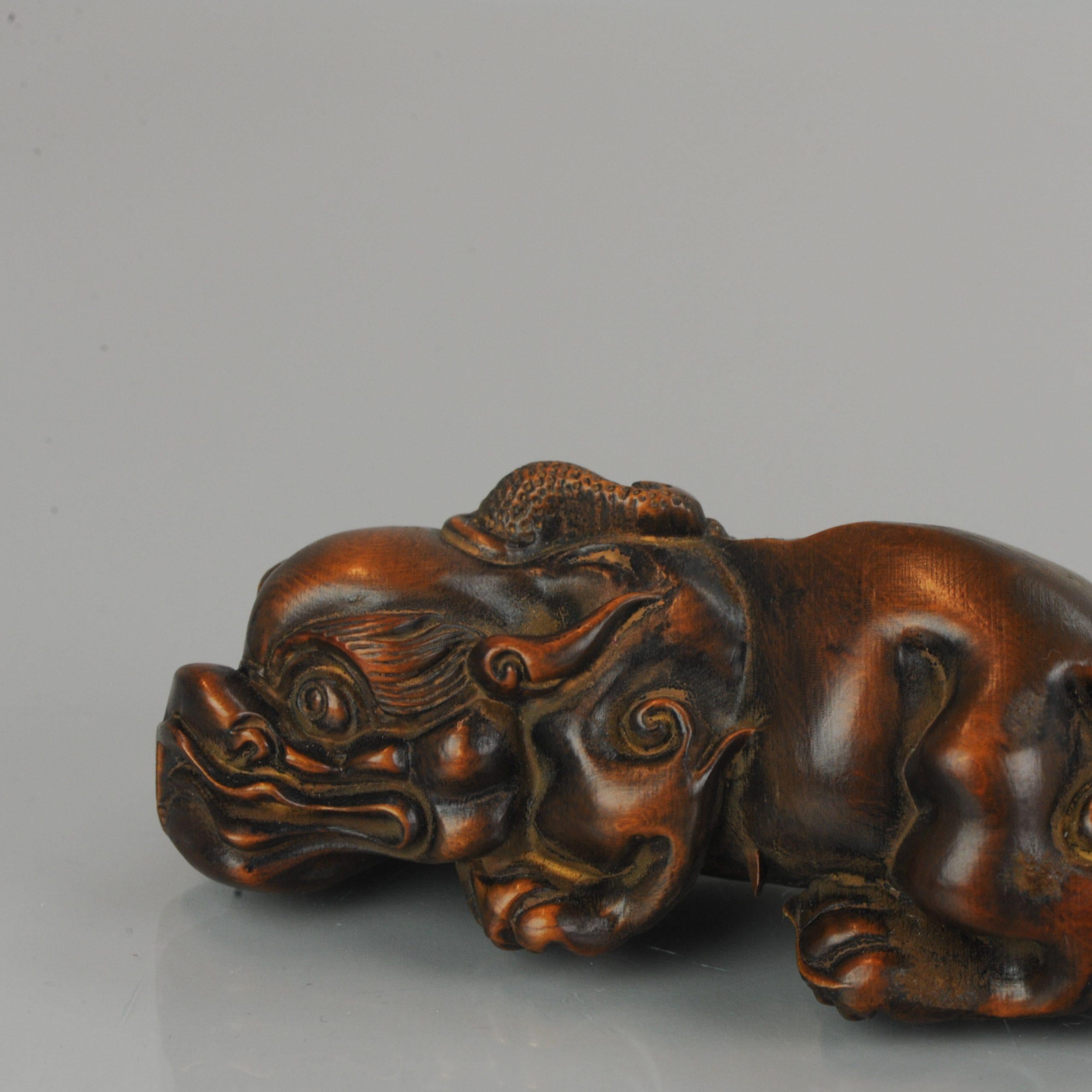 20th Century 18th-19th Century Fine Chinese Carved Wood Statue of a Kirin Mythical Creature For Sale