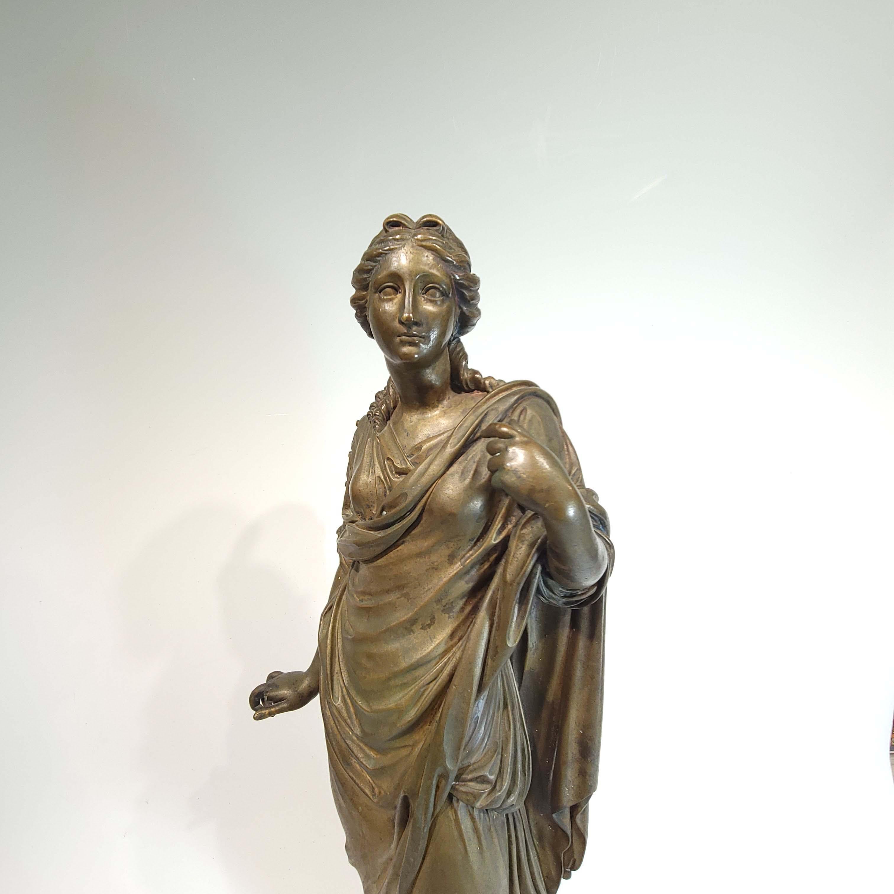 This Bronze is solid cast bronze circa late 18th or early 19th century depicting a renaissance maiden in elaborate robe.
Great casting, woderful details and quite heavy.
Please note that her index finger of her right hand is broken and missing.