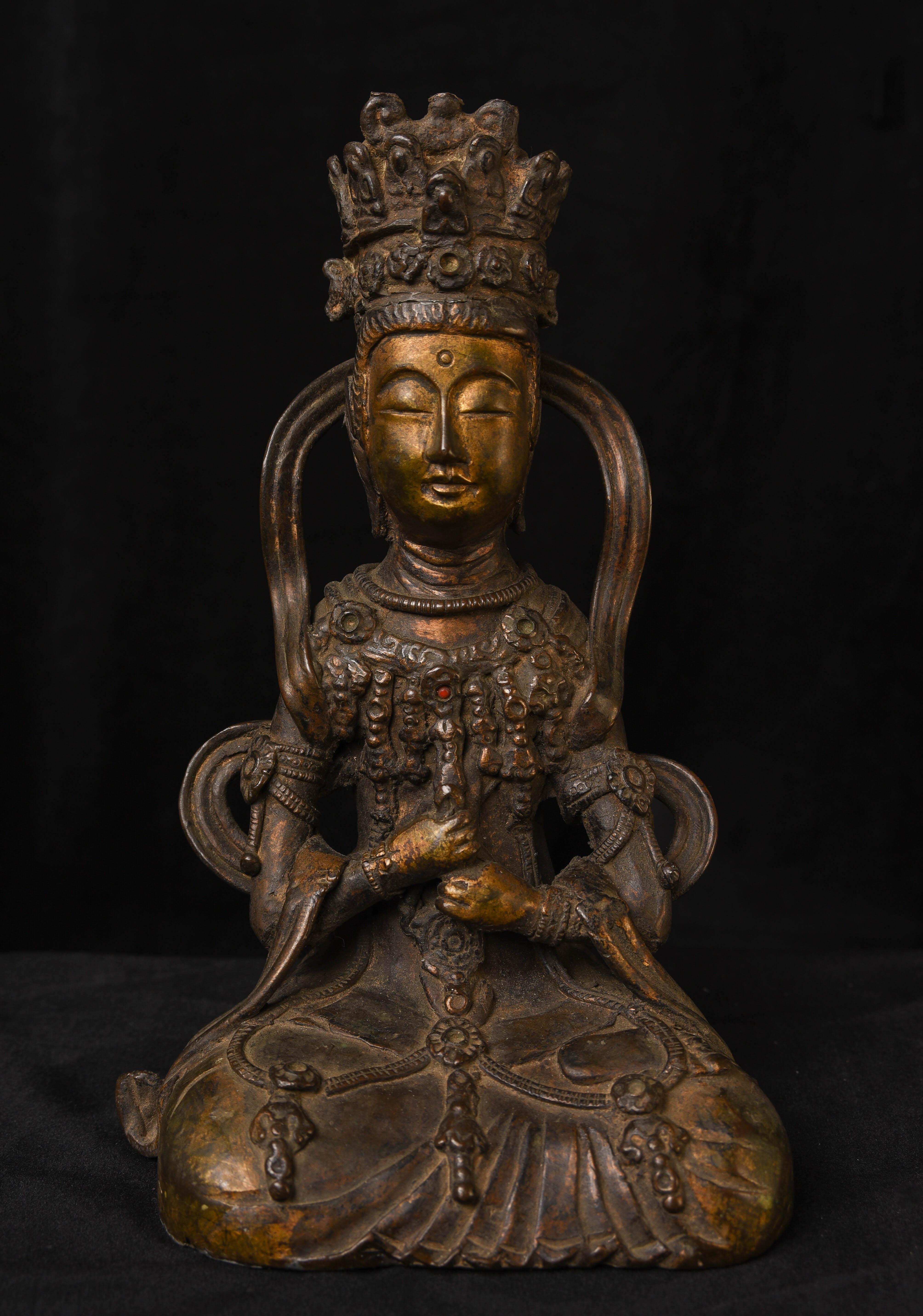 19thC or earlier  bronze Bodhisattva Vairocana, who is associated with wisdom and emptiness. Possibly as early as 15thC based on the style and overall look, but the casting and patina make a later (18/19thC) dating need to be assigned in order to be