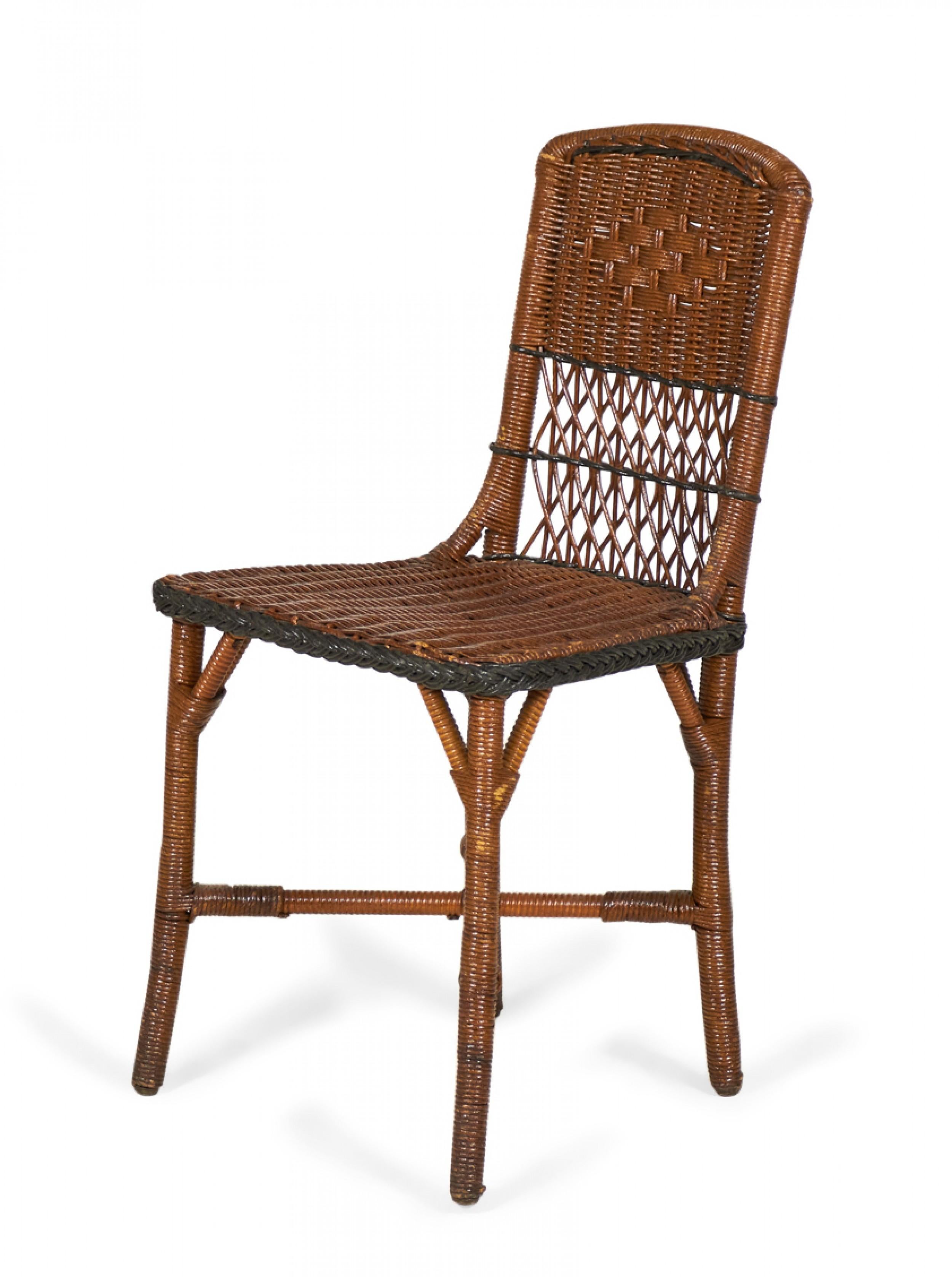 18 American Art Deco-style (1940s) brown wicker side chairs having square backs with a woven diamond pattern above a filigree design with green braided wicker trim. (SHEBOYGAN FIBRE FURNITURE CO label)(priced each).