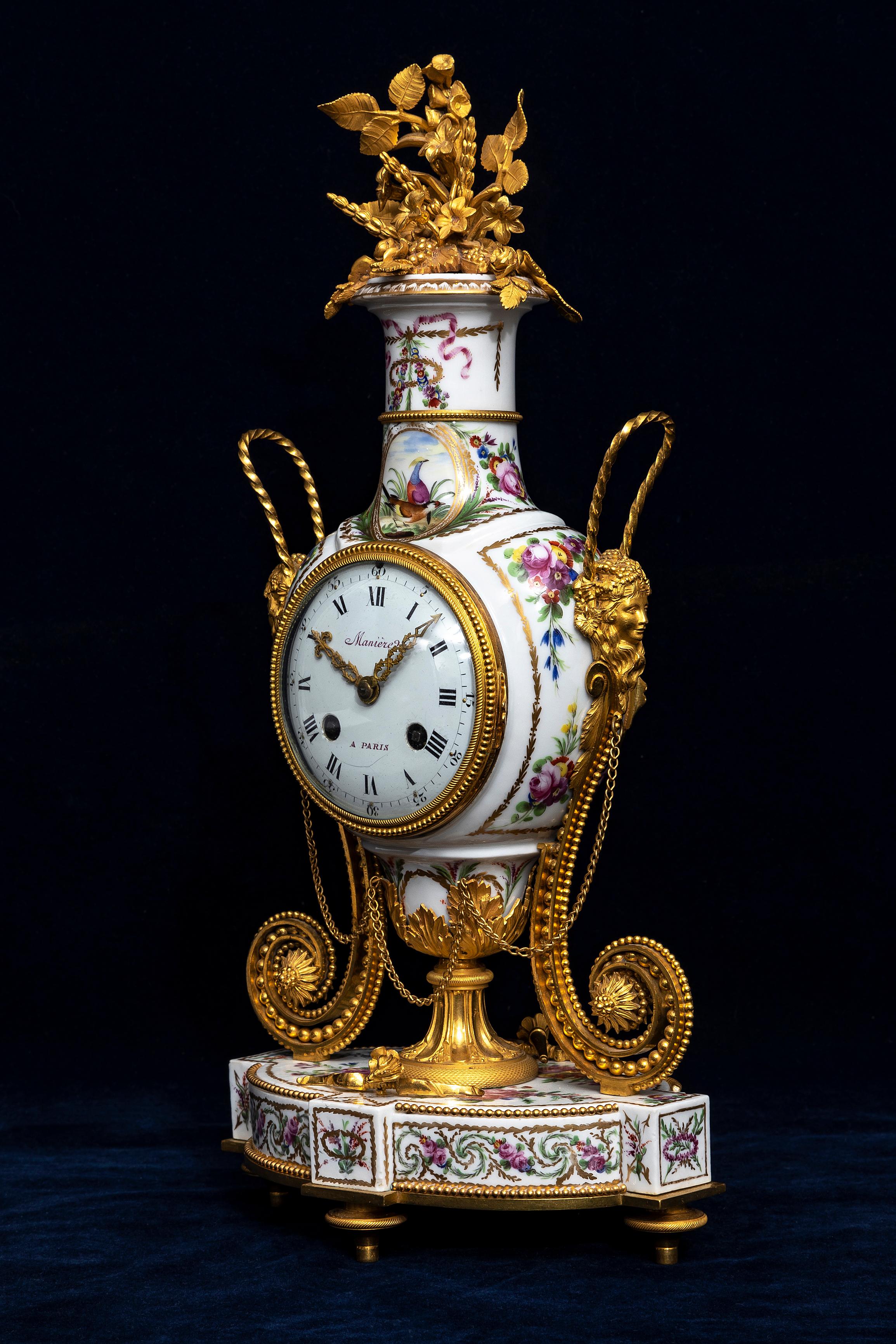 An Incredible and Quite Rare 18th Century Louis XVI Period French Ormolu Mounted Queen’s Manufacture Porcelain Clock, known as the  Marie-Antoinette Clock, The movement by François-Louis Godon.  The clock consists of polychrome hand-painted