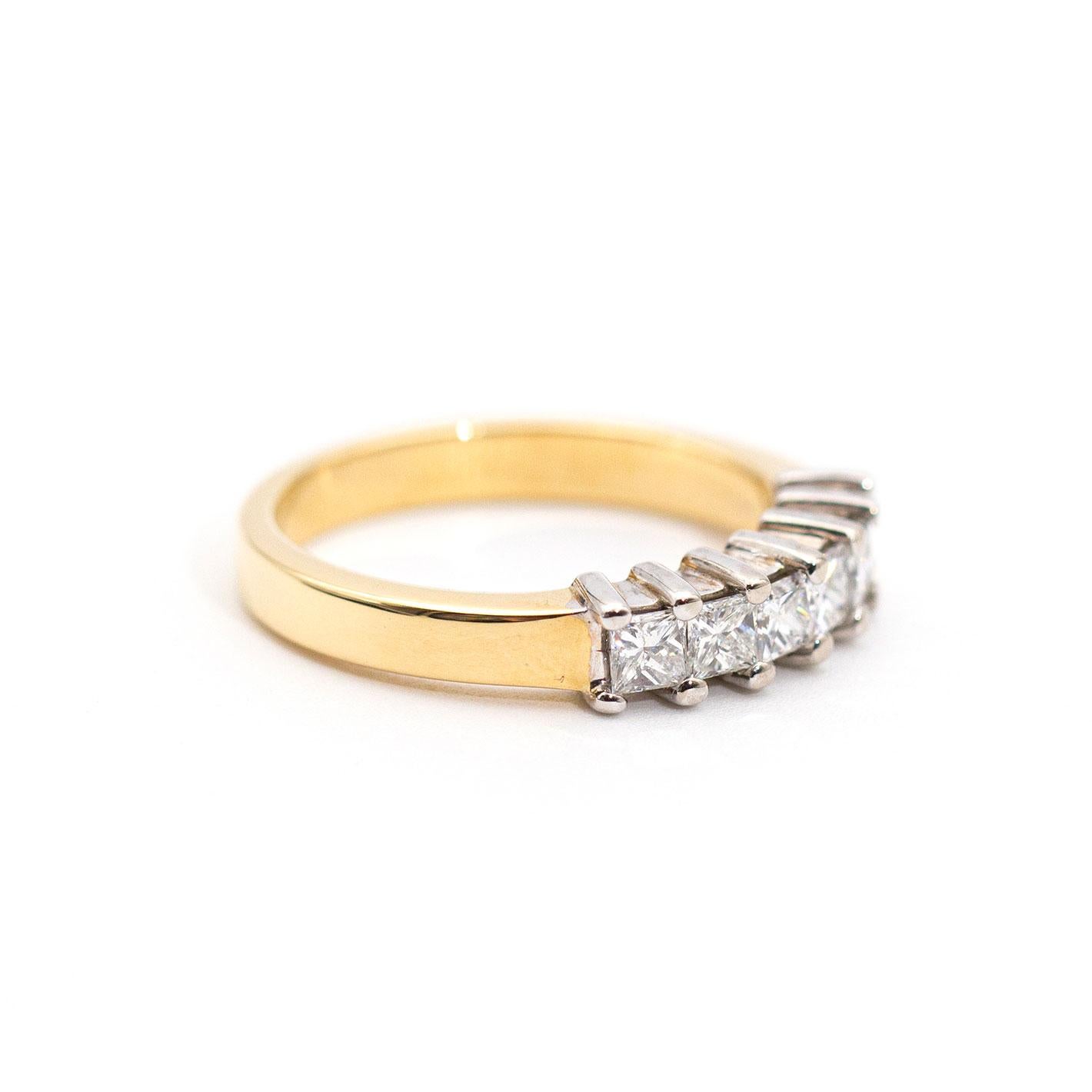 Forged in 18 carat yellow and white gold is this lovely eternity ring featuring a row of six bright princess cut diamonds. We have named this modern vintage piece The Mckenna Ring.  The McKenna Ring is perfect by herself or layer her up with other
