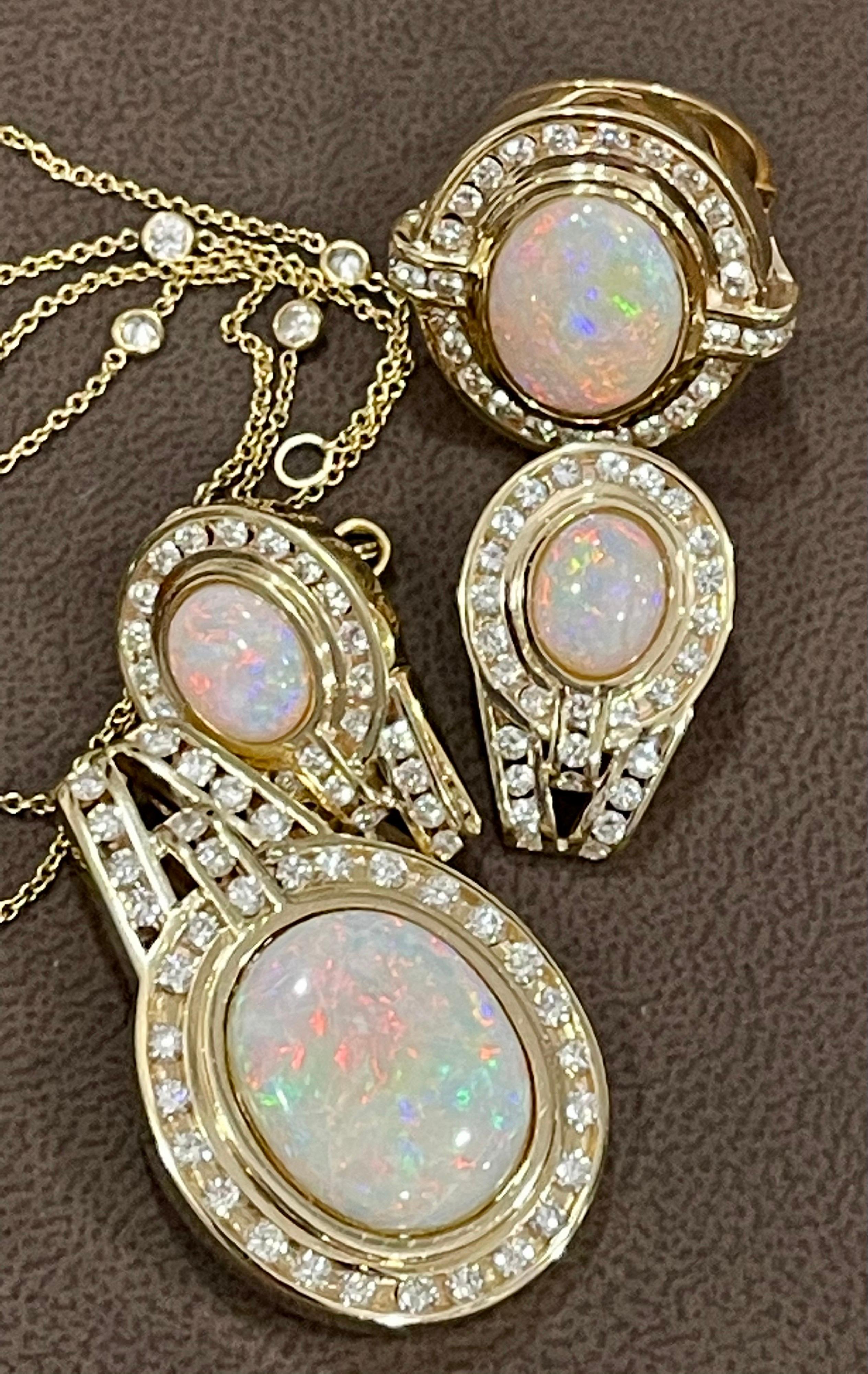 18.35  Carat Australian Opal & 4.57 Ct Diamond Pendant/Necklace/Ring 14 K Yellow  Gold set
This spectacular set consisting of  Australian Opal  includes Four  pieces . Comes with a Diamond by Yard Chain in yellow gold 
Chain is 18 inch in yellow