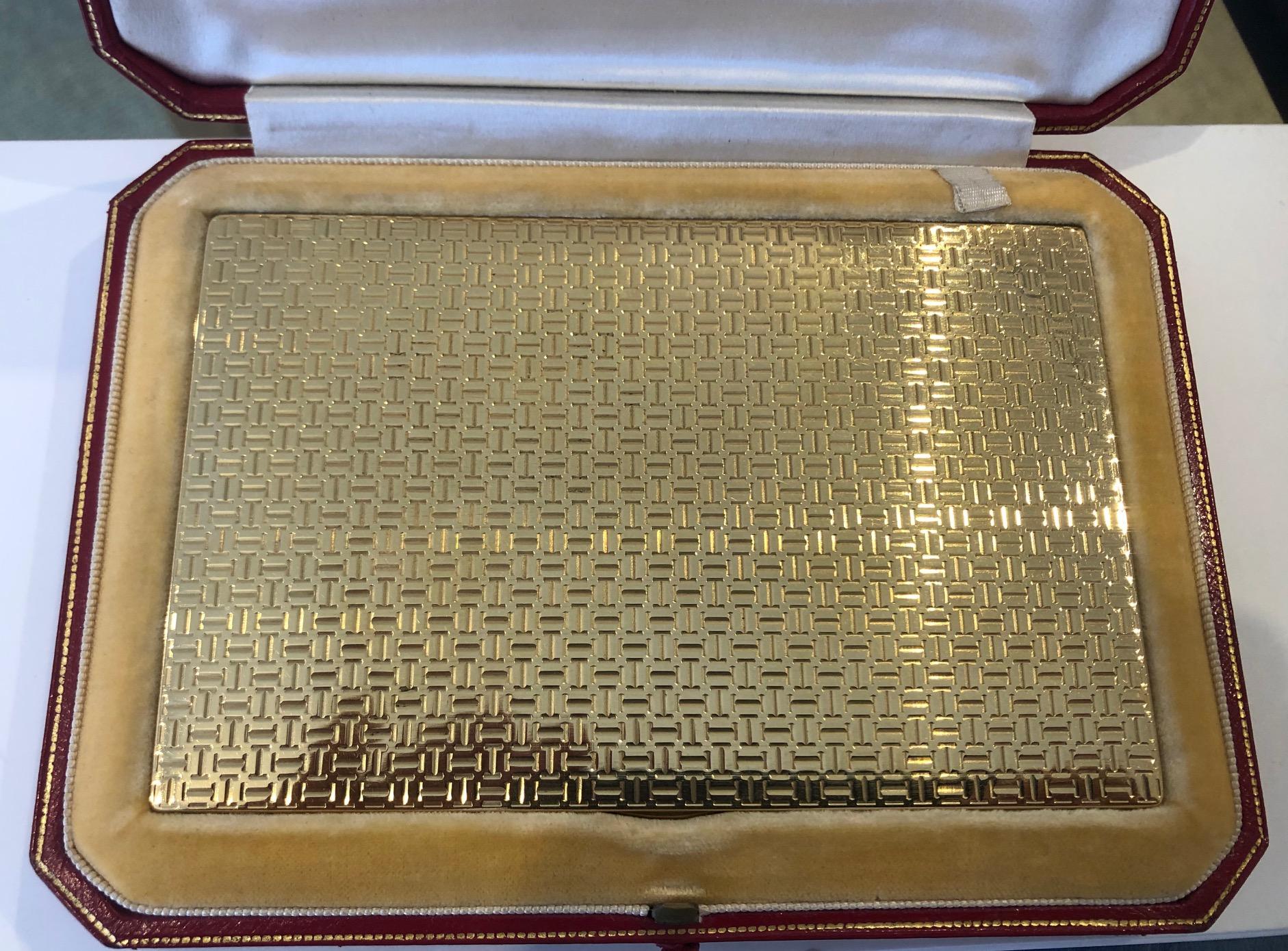 18 Carat Cartier Gold Case with Sapphire Clasp in Original Fitted Box
A Cartier gold case with sapphire clasp in original leather tooled fitted box. This beautifully crafted case weighs approximately 230 grams. It is fully hallmarked and stamped JC