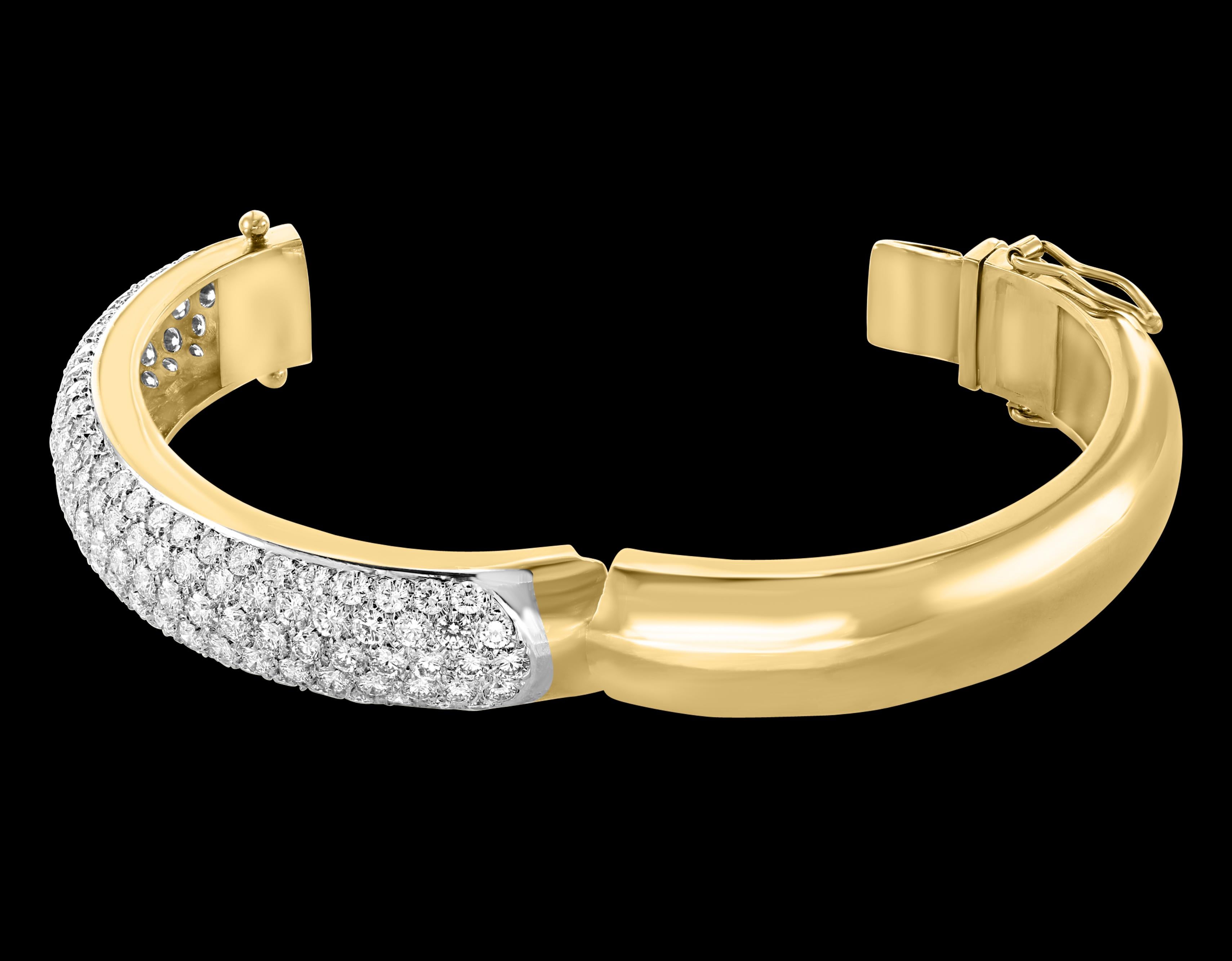 18 Carat Diamonds VS Quality E-F Color 18 K Gold  60 Grams Bangle /Bracelet
It features a bangle style  Bracelet crafted from an 18k white gold and embedded with  18 Carats of  Round brilliant diamonds of the top quality nearly flawless diamonds .