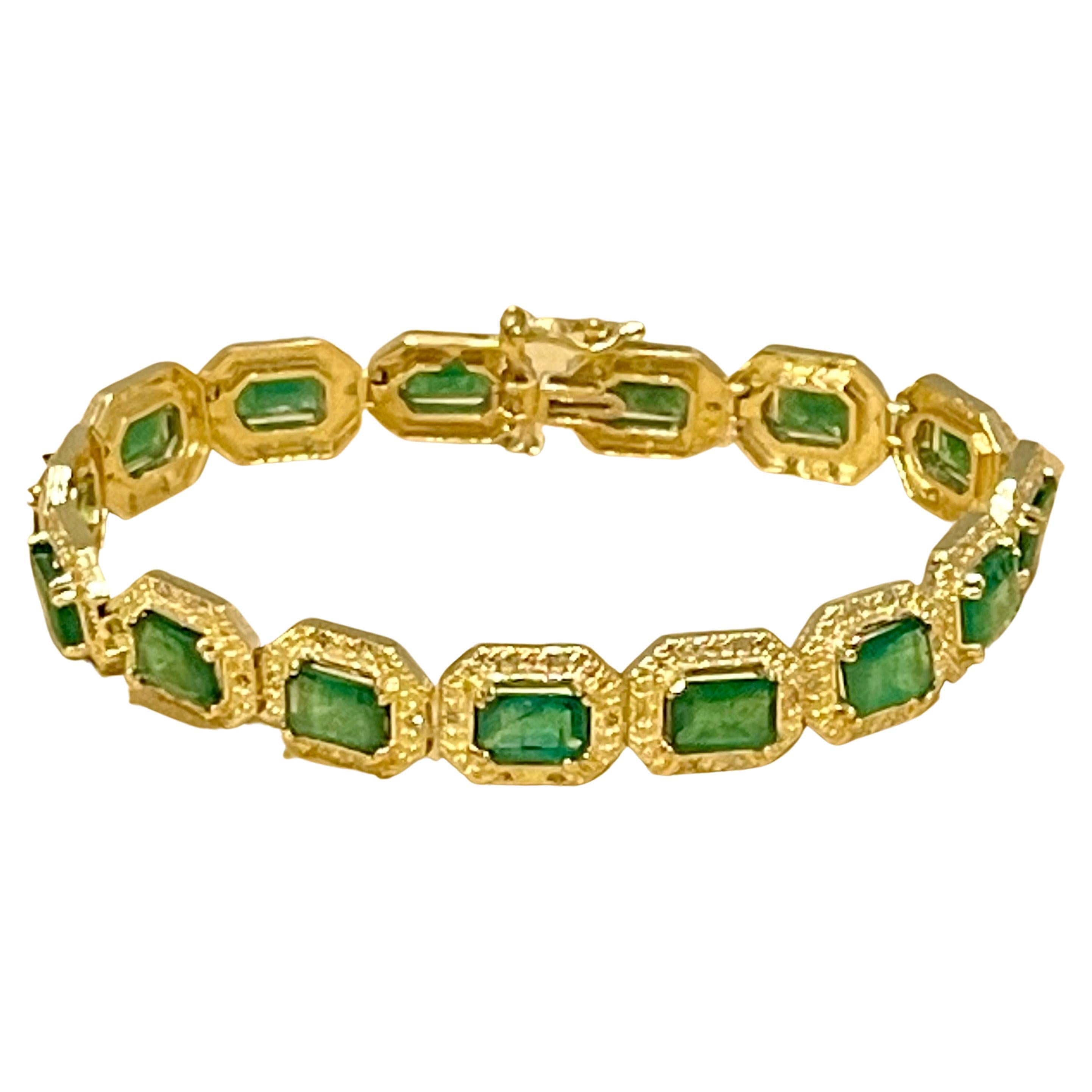 18 Carat Emerald Cut Emerald and Diamond Tennis Bracelet 14 Karat Yellow Gold In Excellent Condition For Sale In New York, NY