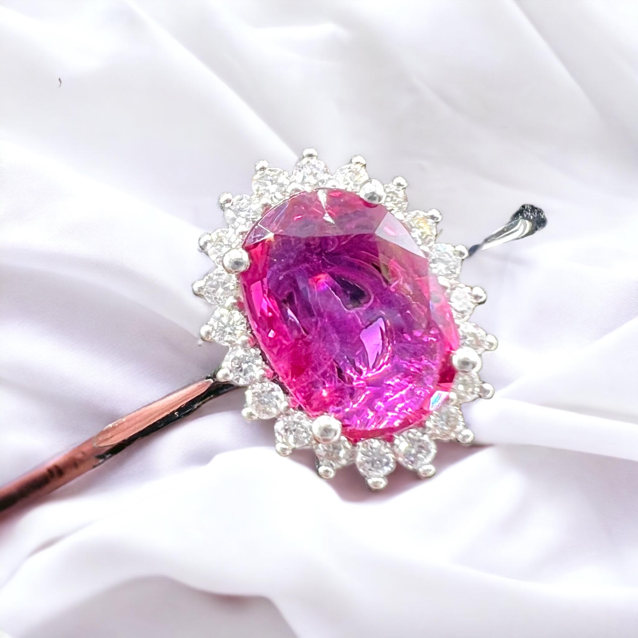 Artisan 18 Carat Engagement Ring Set Pink Sapphire Surrounded by Diamonds For Sale