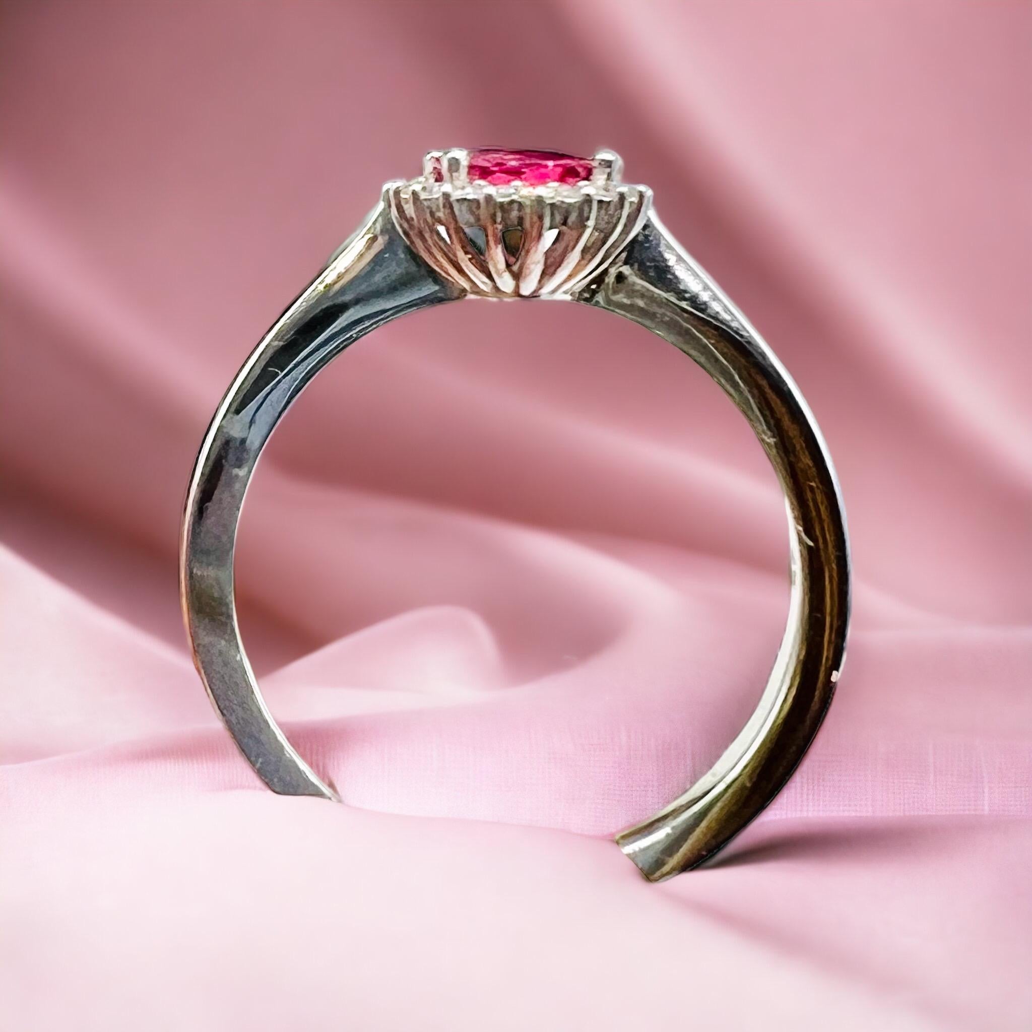 18 Carat Engagement Ring Set Pink Sapphire Surrounded by Diamonds For Sale 1