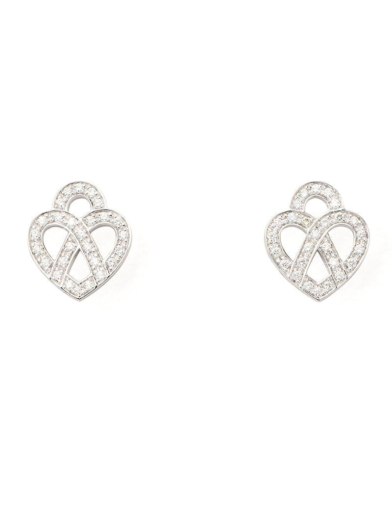 The timeless Poiray collection, Coeur Entrelacé, reveals itself in pure lines, with generous curves, and is dressed in gold or diamonds to celebrate all loves.

Cœur Entrelacé earrings in white gold and diamonds.

Diamond - 0.2 carat 

Please note