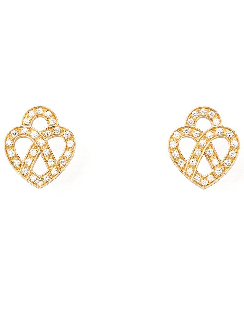 The timeless Poiray collection, Coeur Entrelacé, reveals itself in pure lines, with generous curves, and is dressed in gold or diamonds to celebrate all loves.

Cœur Entrelacé earrings in yellow gold and diamonds.

Diamond - 0.2 carat

Please note