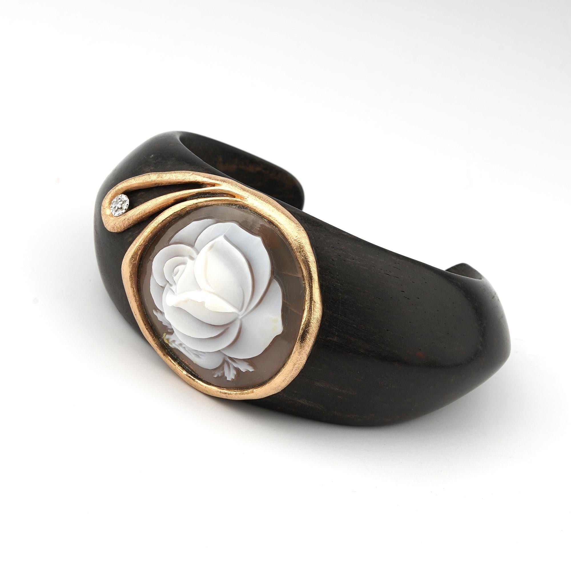 18 carat Gold and Ebony Bracelet with 0,02ct diamonds and 30mm Rose carving Cameo. Exclusive gold jewellery piece made, carved in Ebony, with 18kt gold frame embellished with 0,02ct diamond  and with 30mm long Sea Shell cameo with a Rose Carving.