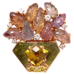 Blumenkorbbrosche aus 18 Karat Gold und Edelsteinen