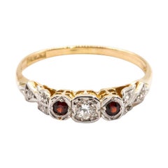 18 Carat Gold and Platinum Round Diamond and Red Garnet Three Stone Vintage Ring