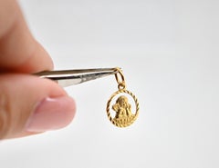 18-carat gold angel pendant