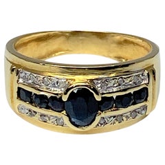 18 Carat Gold Bangle Ring Set with Sapphires and Diamonds