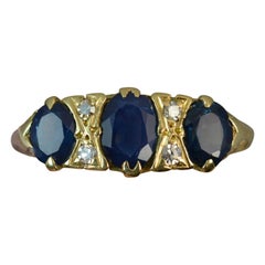 18 Carat Gold Blue Sapphire and Diamond Cluster Ring