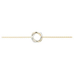 Bracelet en or jaune et blanc 18 carats, collection Tresse