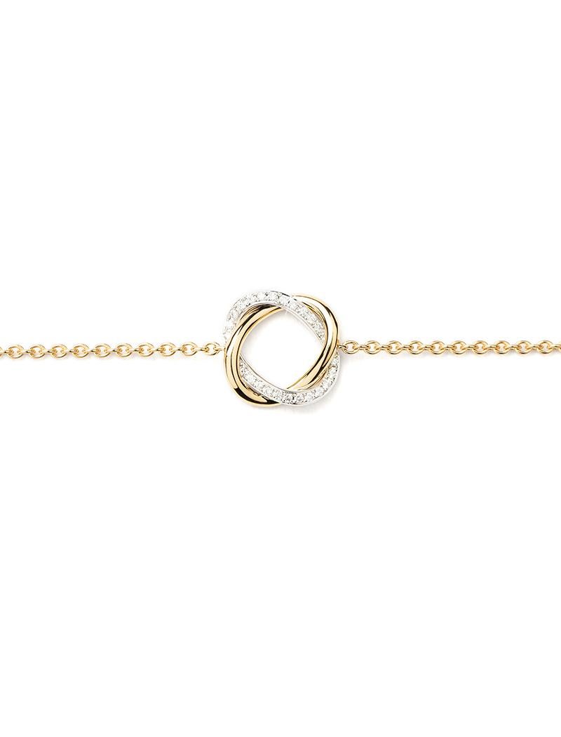 With its two delicately intertwined strands of gold, the Tresse collection is inspired by the elegance of couture and symbolises the bond of love.

Tresse bracelet in yellow and white gold with diamonds on a yellow gold chain.

Pattern size: 13x13