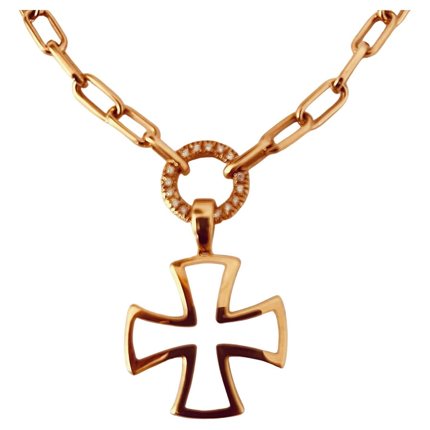18 carat yellow gold, diamond and enamel cross pendant necklace. The open link chain connected to a diamond suspended ring and white enamel cross. 46cm long. 38 grames weight. Aprox. 0.2 carat diamonds. Price: 5,230£. Hallmarks: signed Gavello 750