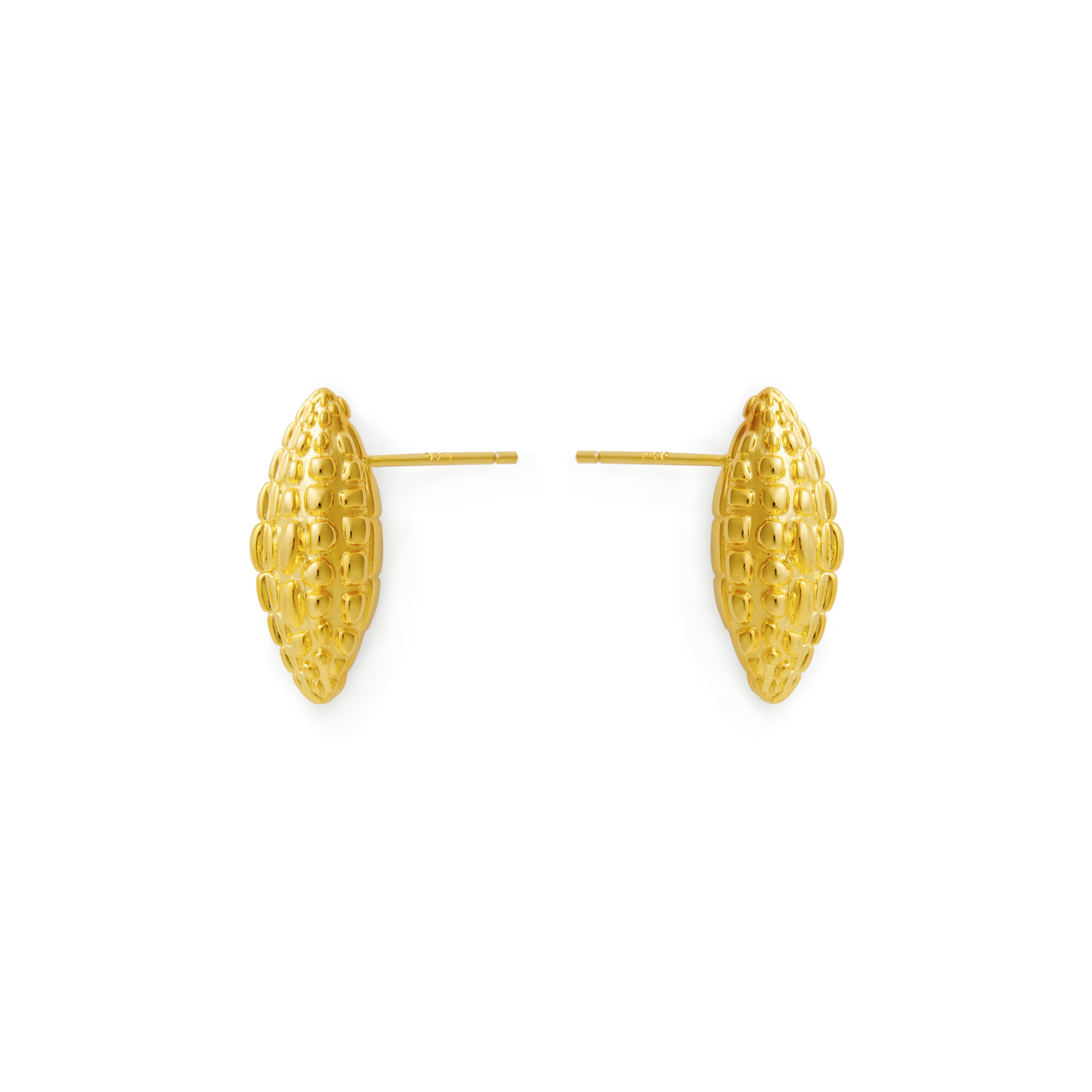 Mistova's Danger eye earrings are made from the finest 18K gold. Inspired by the protective armor of the skin of the crocodile. These earrings add strength and attitude to ones jewelry collection.